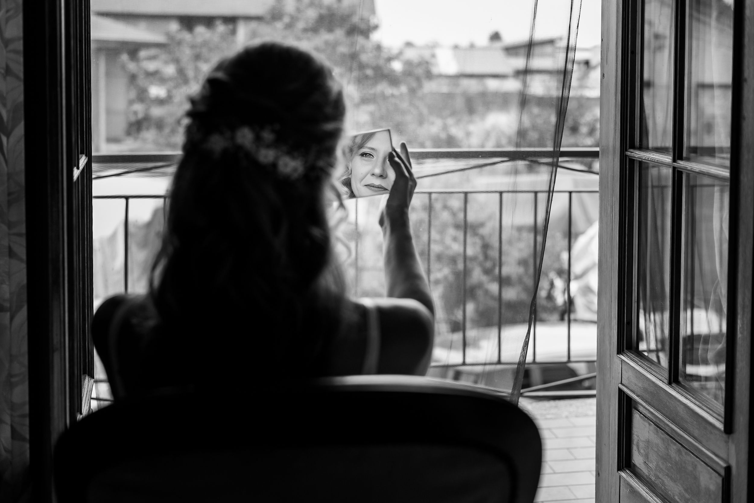 A black and white montage of subway or bus windows shows passengers in silhouette during transit.