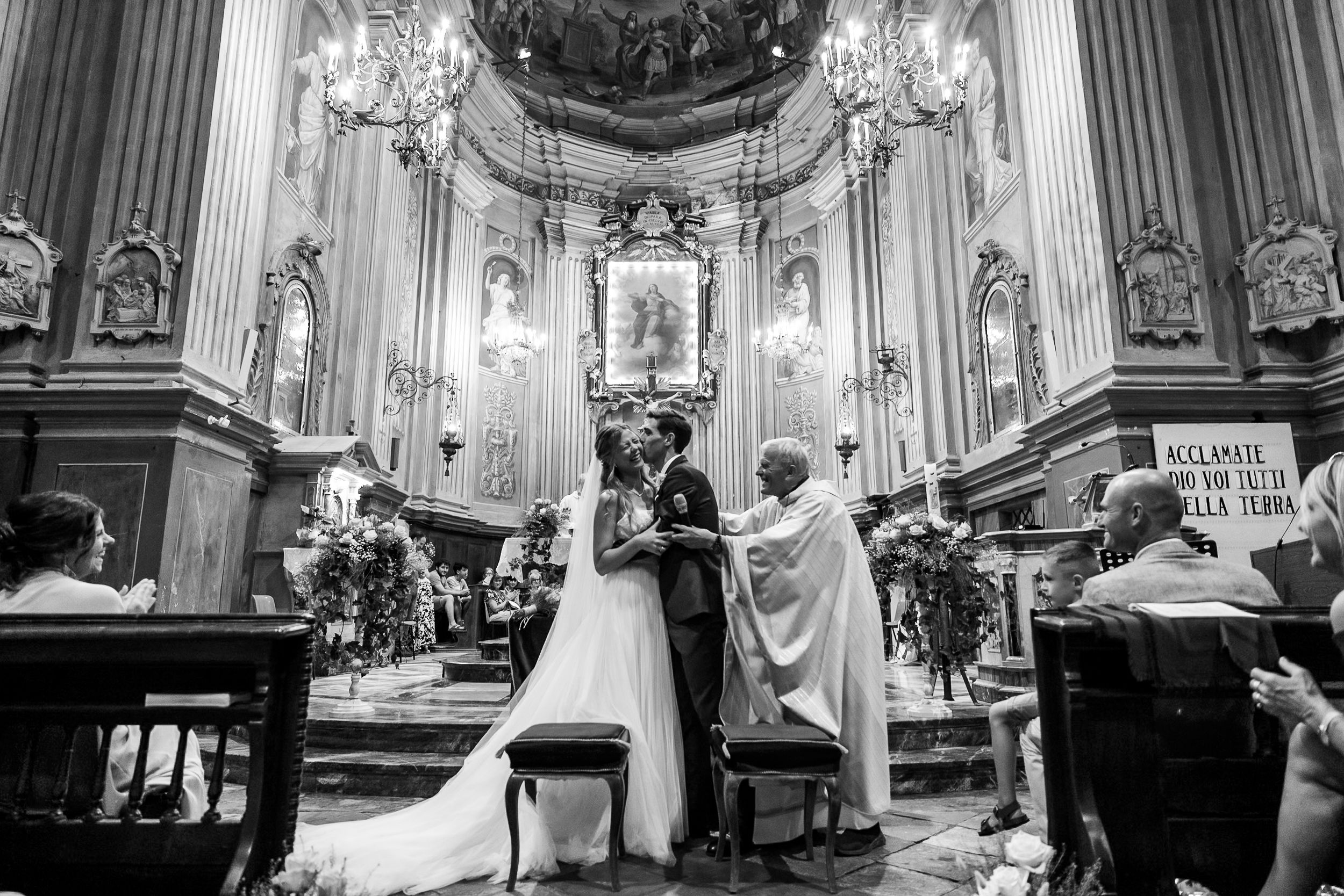 Black and white montage of multiple church wedding ceremony photos showing interior cathedral architecture and altar setups.