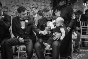 A collection of candid black and white photographs showing joyful moments at what appears to be a celebration or event.