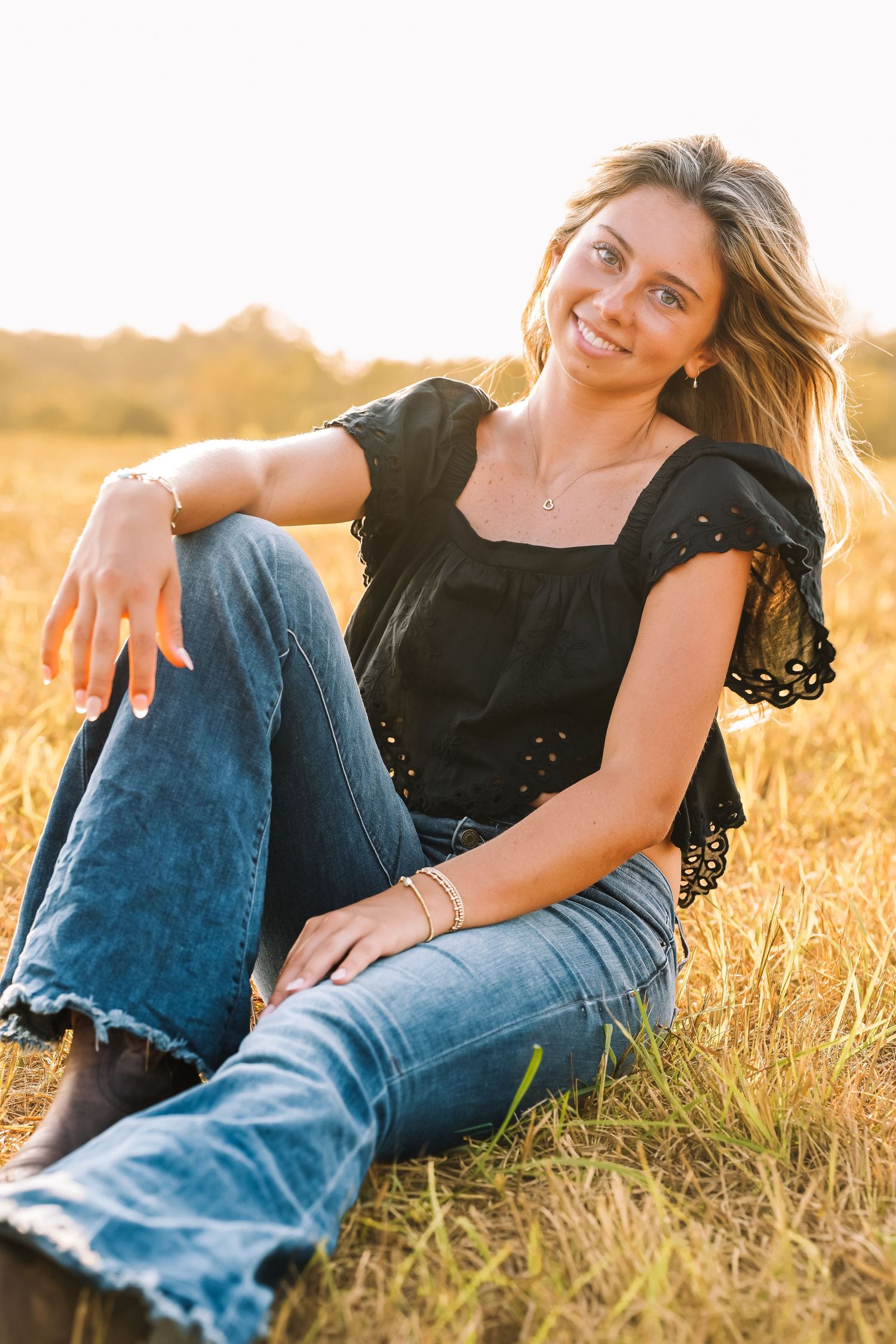 Graduation portrait session in the Manassas, Virginia - beautiful tall grass field | Senior photos by Alina Phillips Photography.