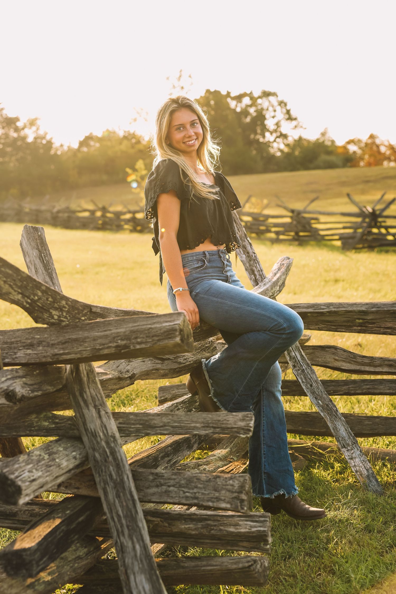 Graduation portrait session in the Manassas, Virginia - beautiful tall grass field | Senior photos by Alina Phillips Photography.