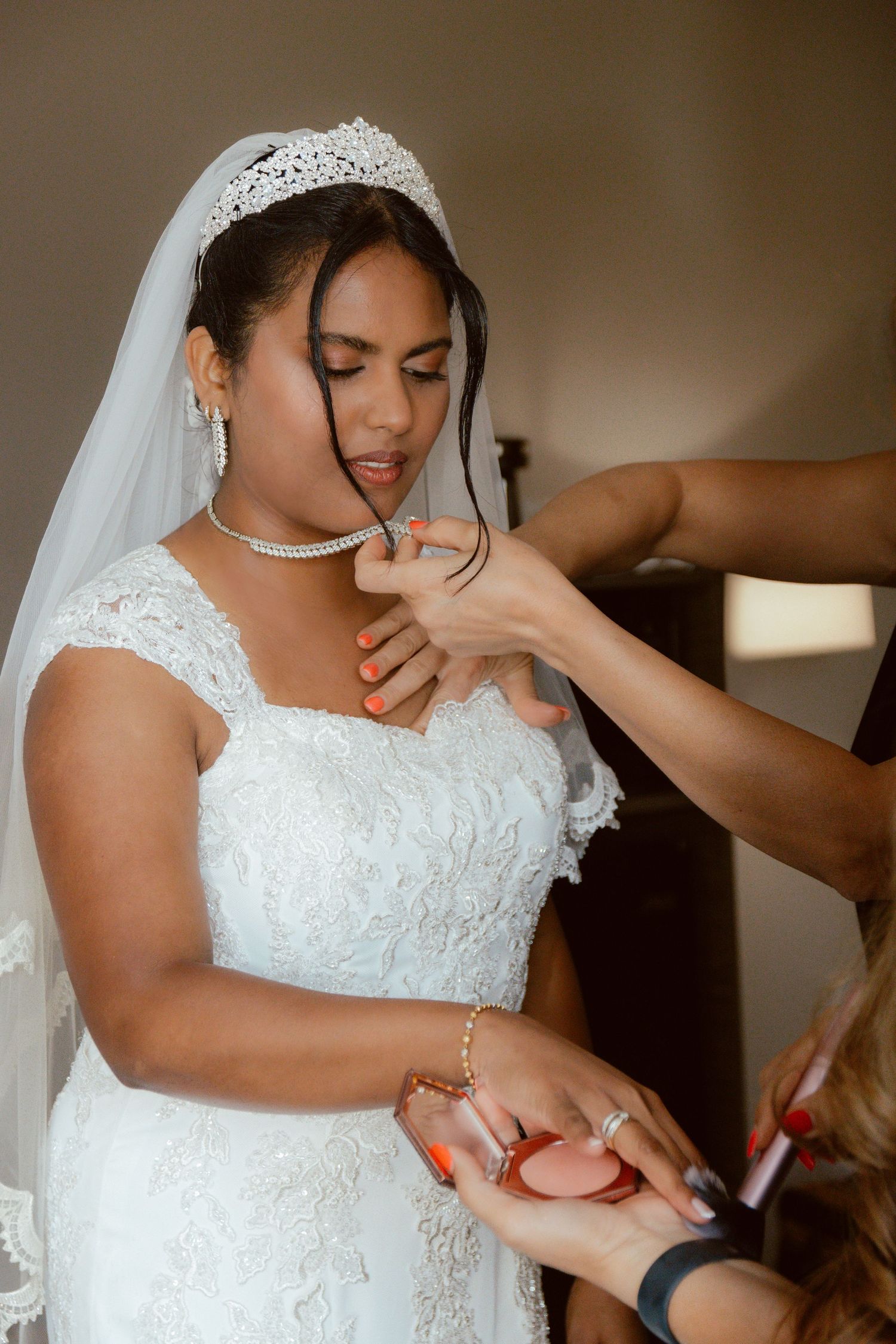 Final touches being added to bridal accessories and jewelry.
