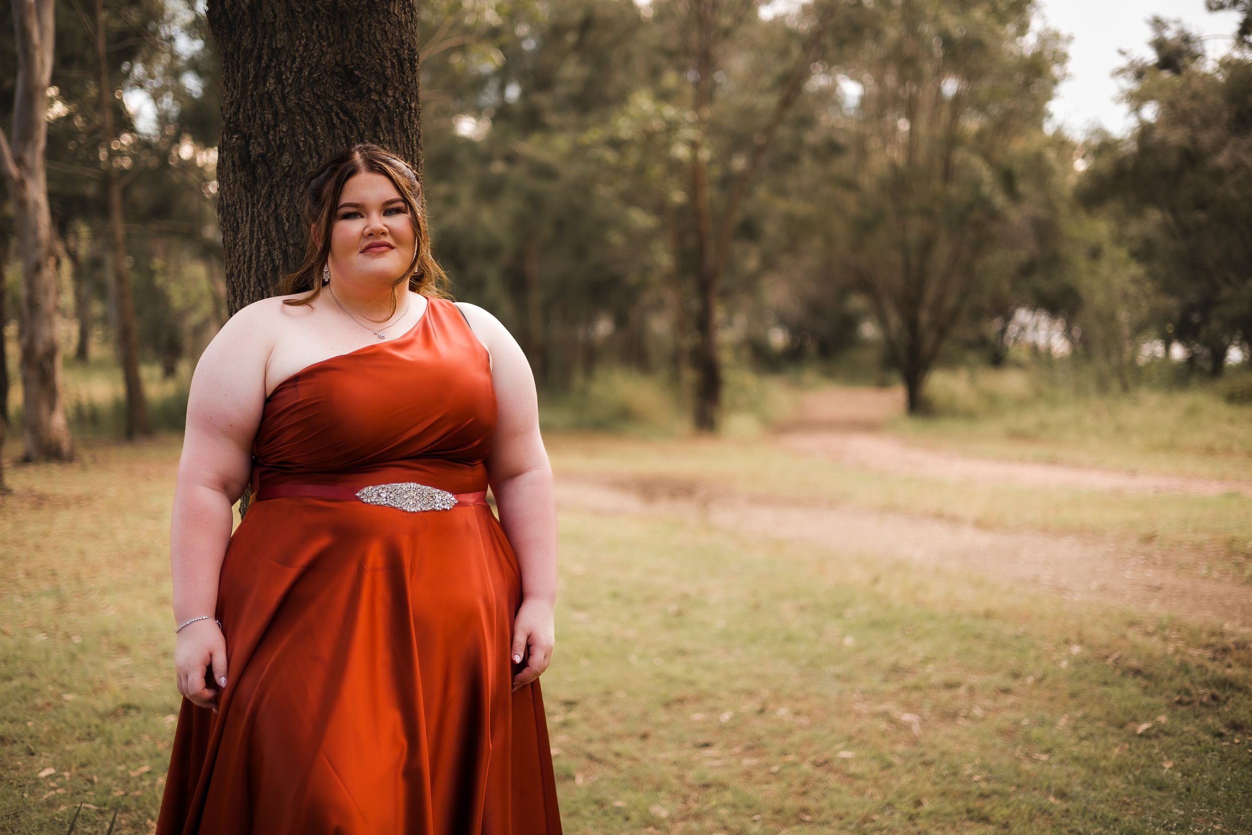 Formal photoshoot at Kingaroy Dam in South Burnett, featuring a girl in an elegant formal dress for grade 12 graduation