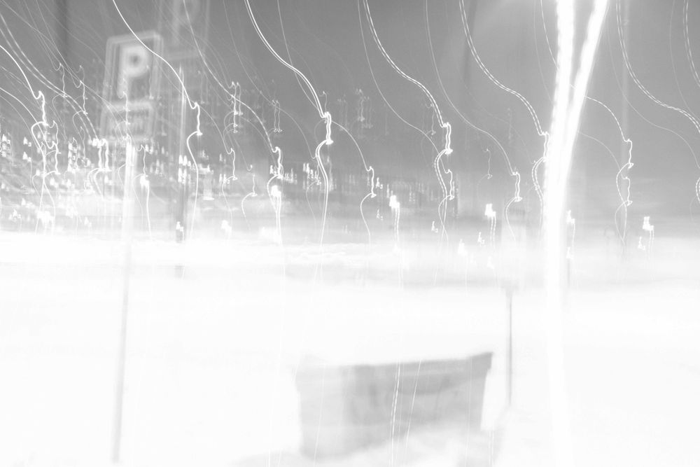 Traffic sign, a box and some lights. Winter time. ICM technique.