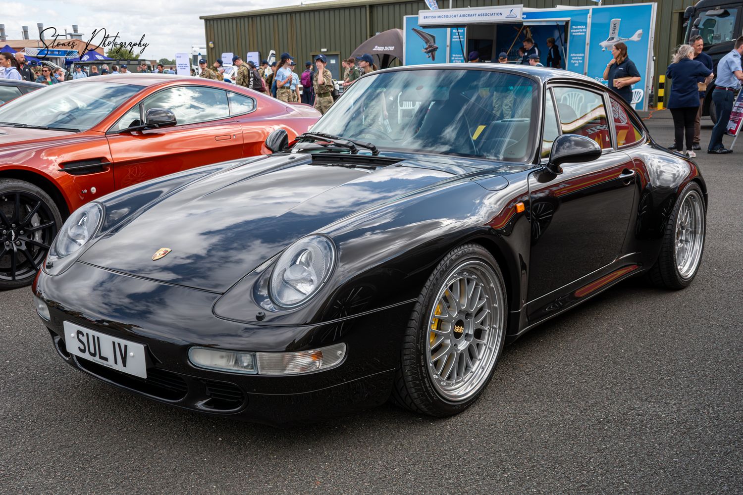 A 1997 Porsche 911 Carrera S parked as a Static during the National Air and Space Camp Industry Day in 2024.