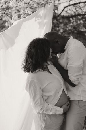 Intimate black and white photography with white fabric.