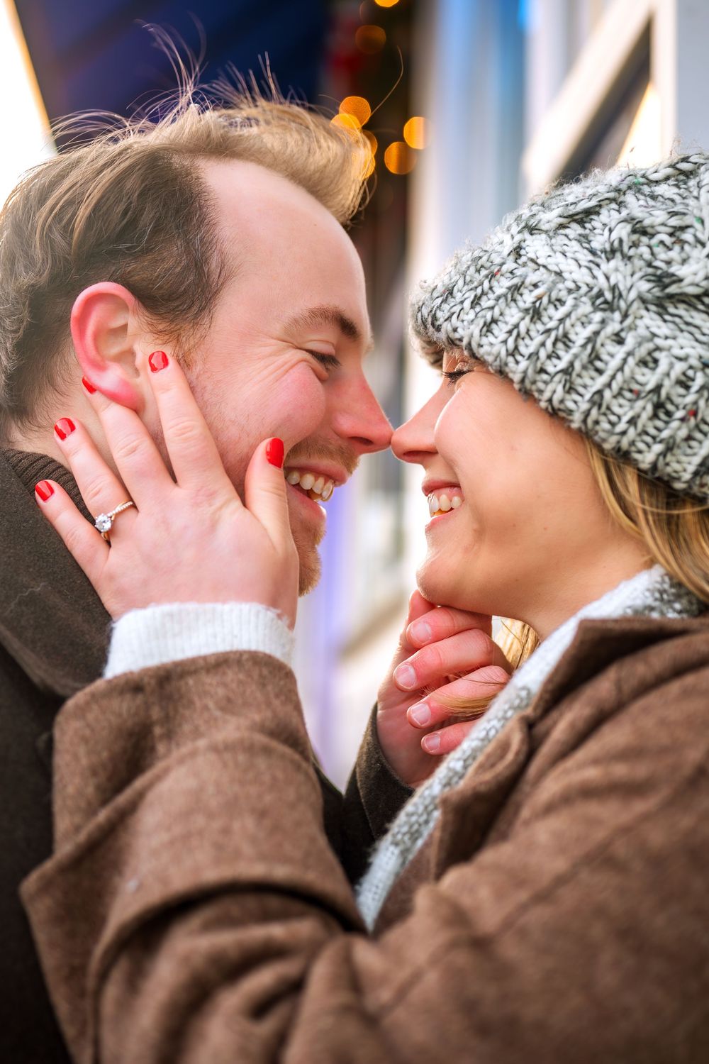 Romantic winter engagement photo sequence showing tender moment between couple.