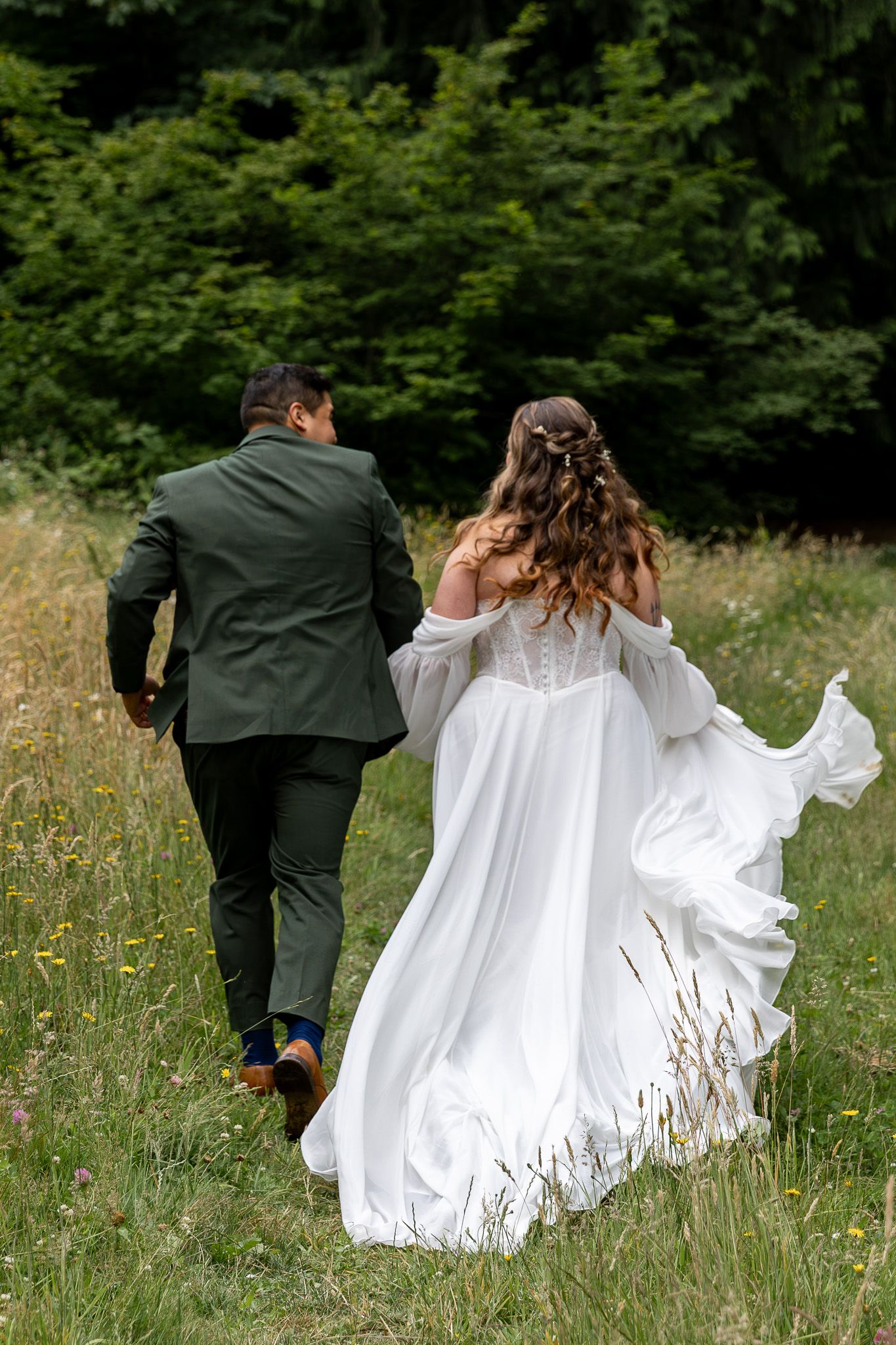 Bride and groom during bridal portraits in the forest.
