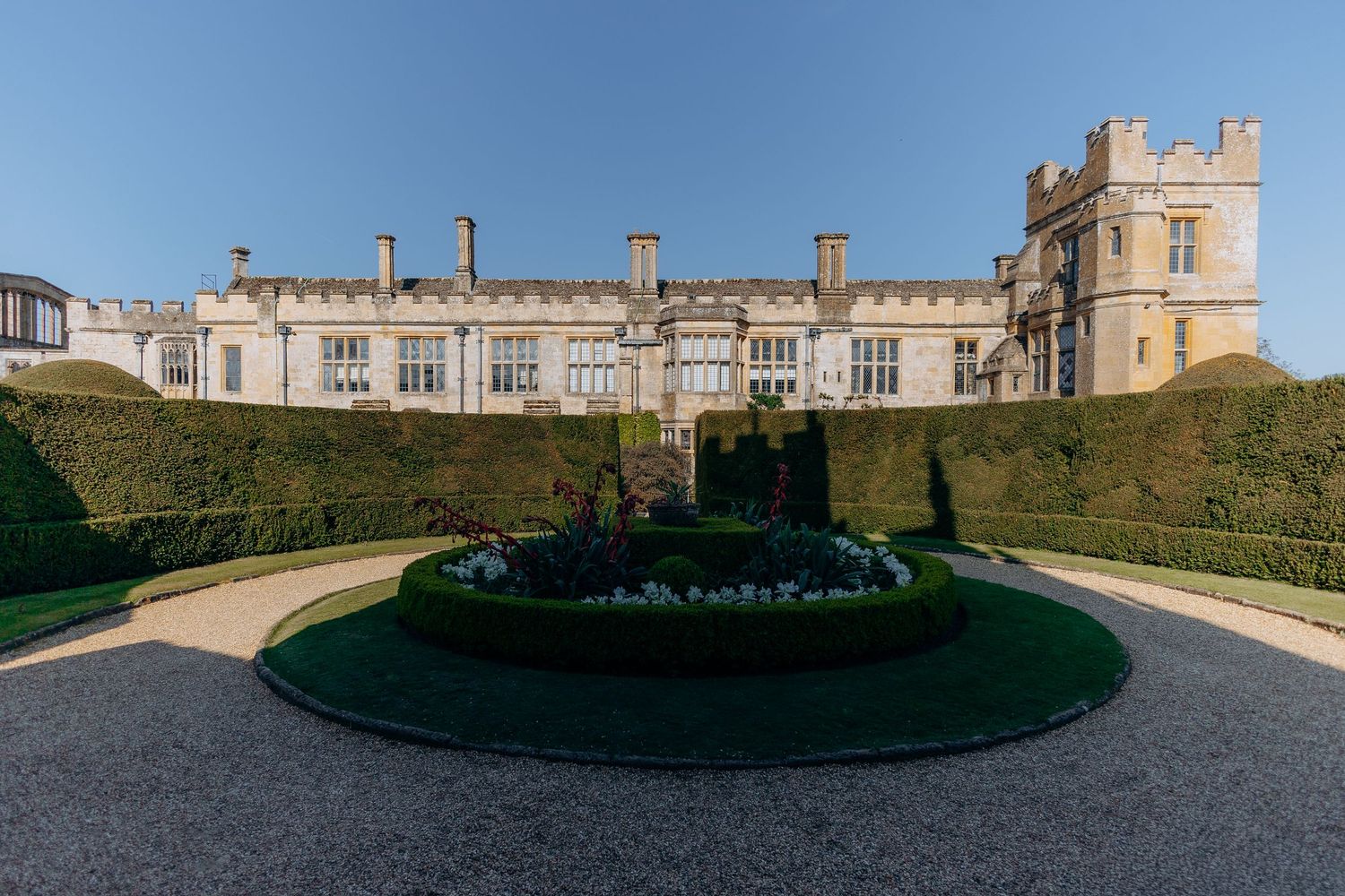 Sudeley Castle wedding venue in the Cotswolds surrounded by gardens.