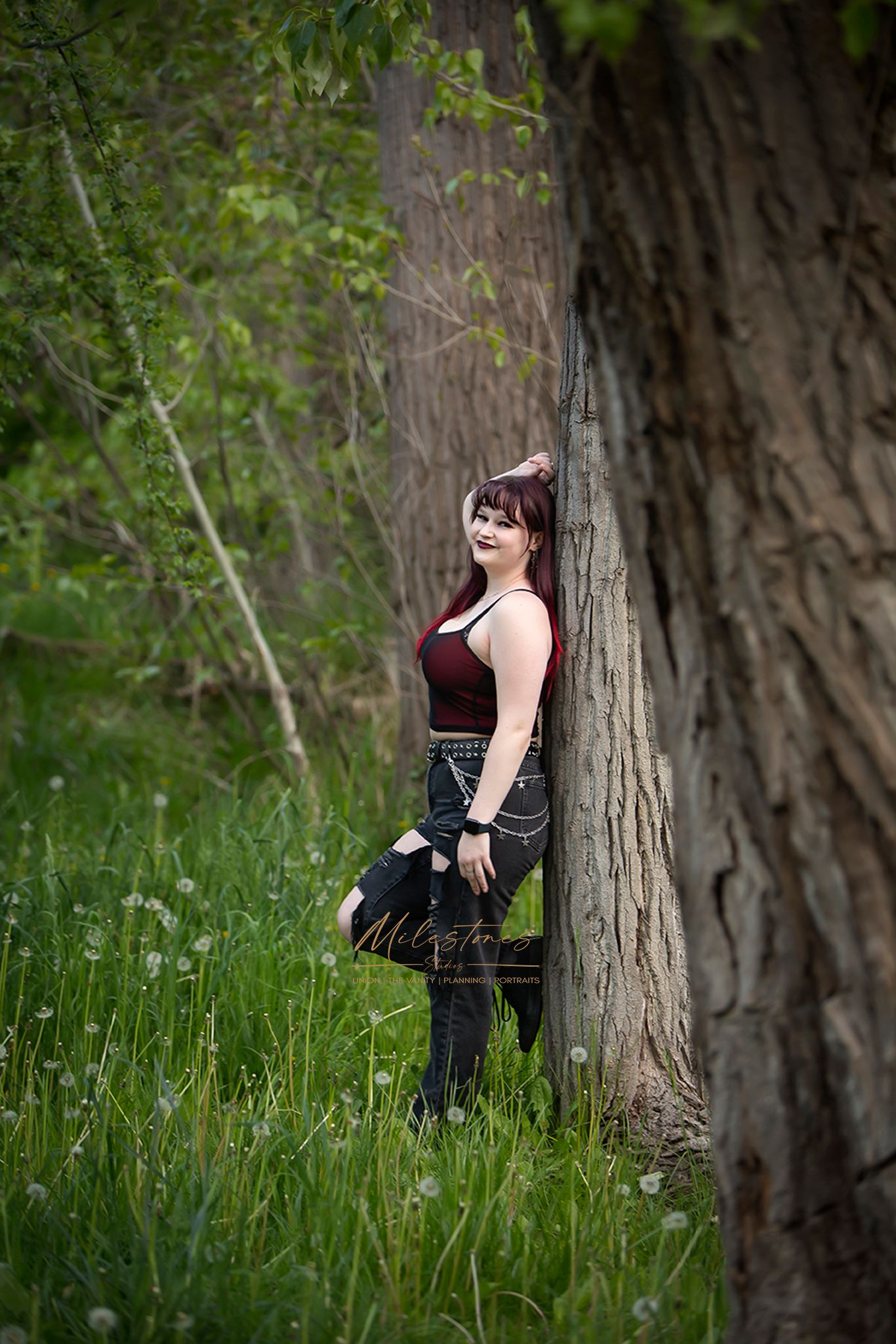Senior photos Boise River Milestones Studios girl leaning on tree