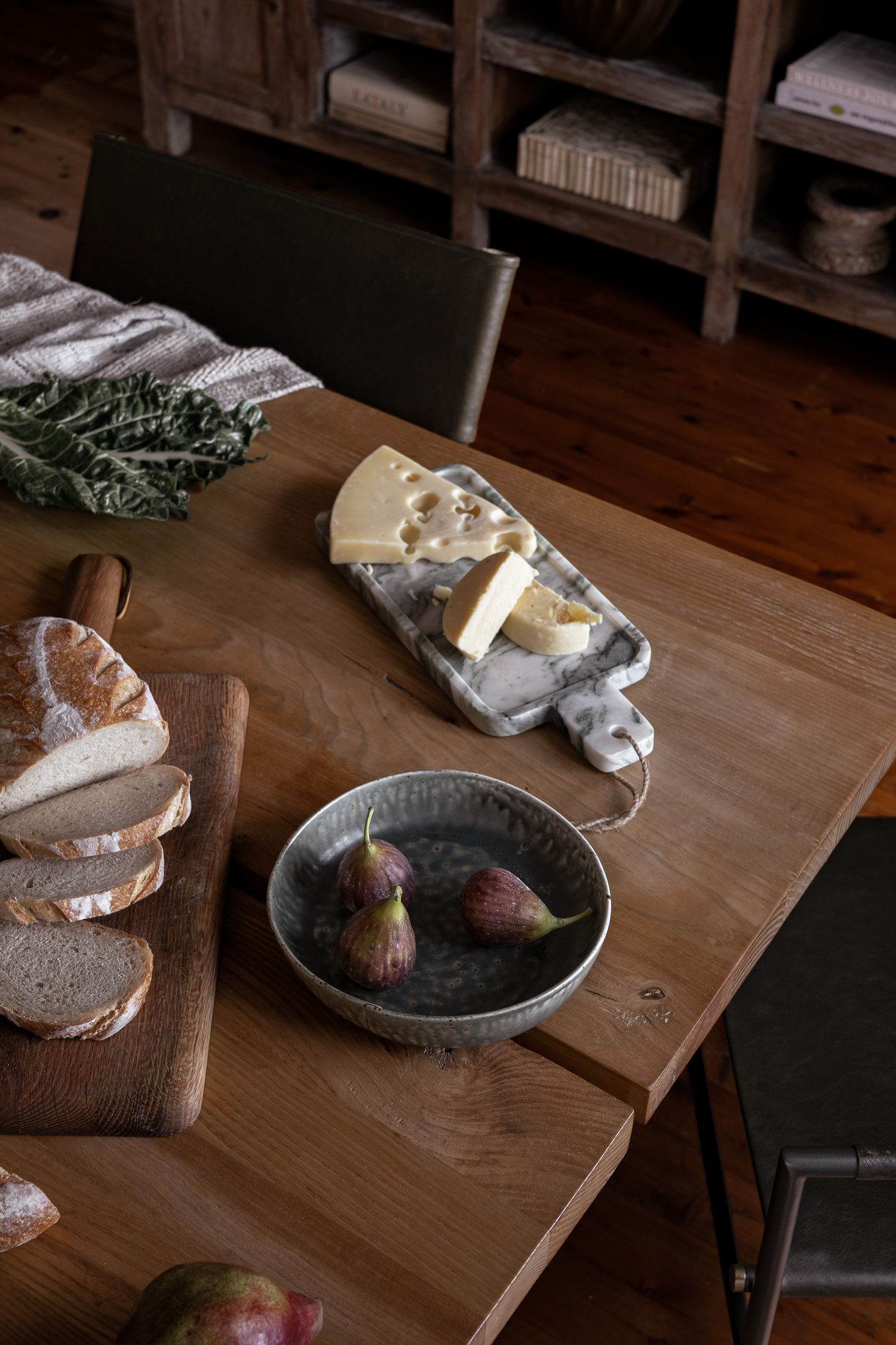 Coastal lifestyle detail photography featuring food styling and timber dining table in a Hyams Beach cottage.