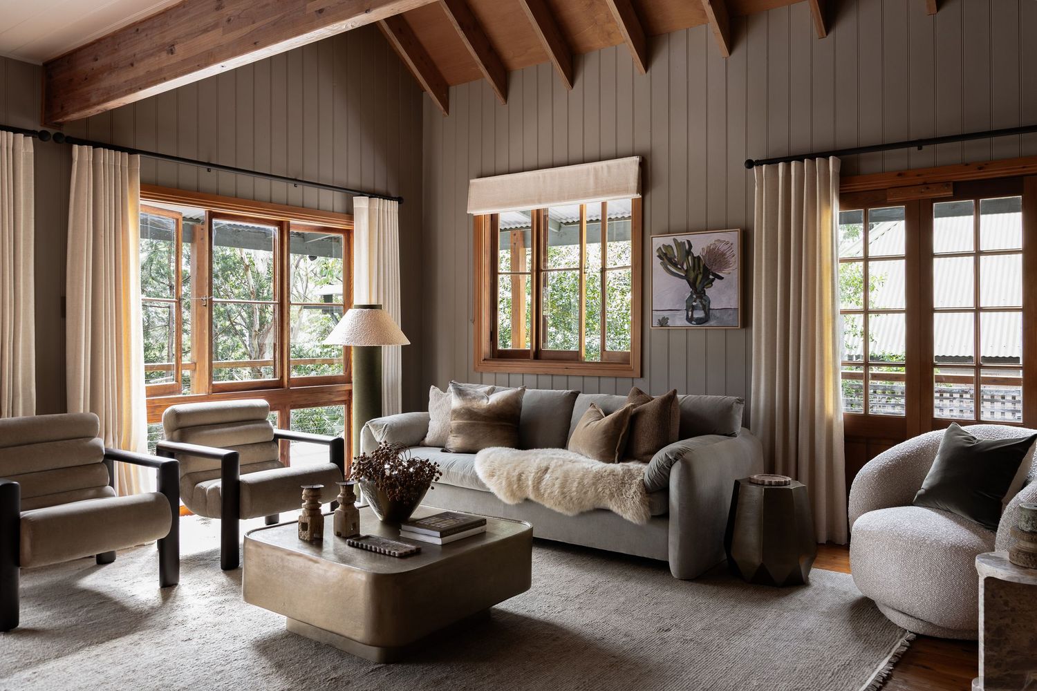 Interior photography of a warm and textural living space in Hyams Beach, NSW captured for a South Coast coastal cottage.