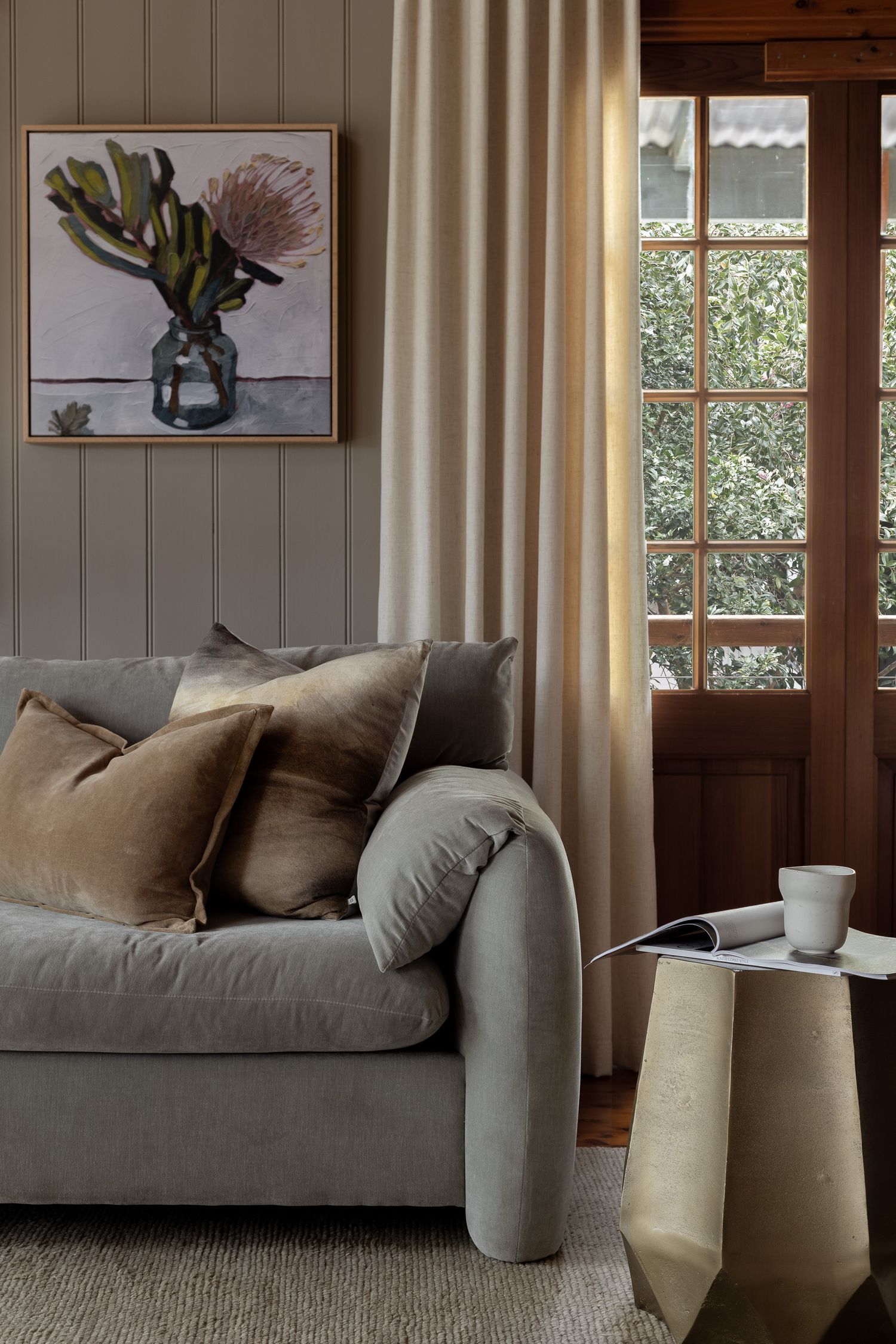 Lifestyle interior photography of relaxed coastal living in a timber cottage captured in Hyams Beach, NSW.