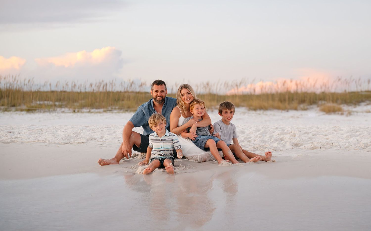 Best beach to visit in Santa Rosa Beach for sunset pictures. Professional Family Photographer plans candid and natural photos.