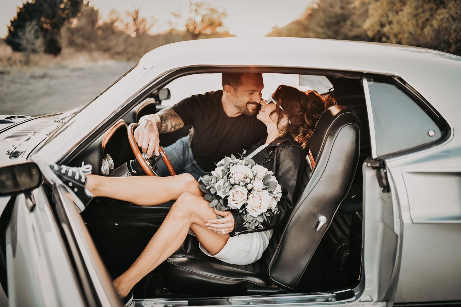 luxury engagement session featuring vintage muscle car and romantic couple