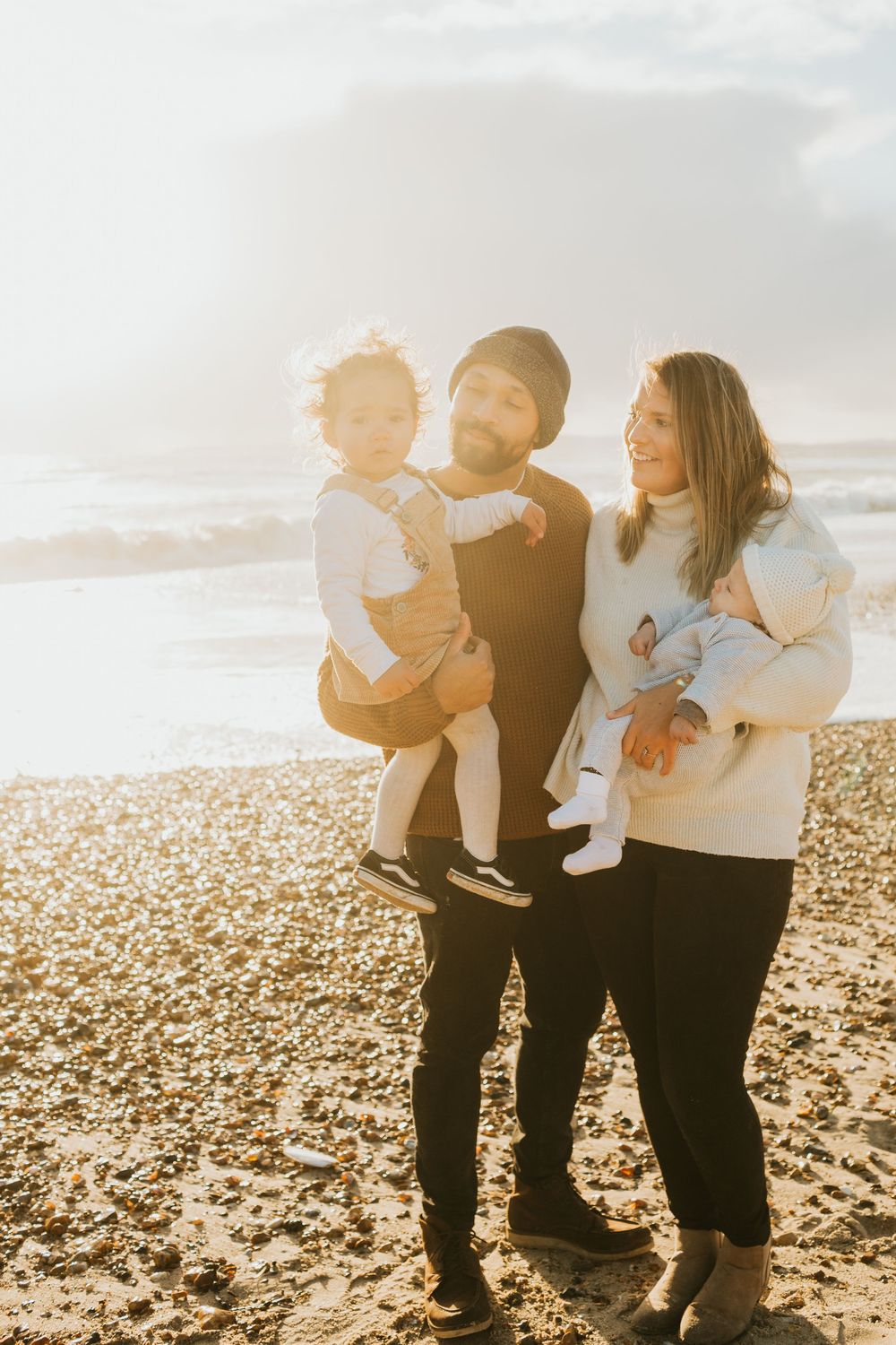 Dorset beach newborn photoshoot family at golden hour, hengistbury head, Southbourne beach