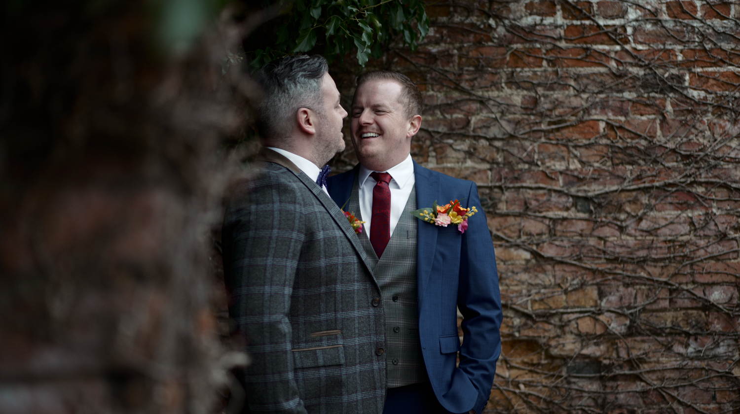 Matt and Daryl celebrating their wedding at Stock Farm Barn in Cheshire