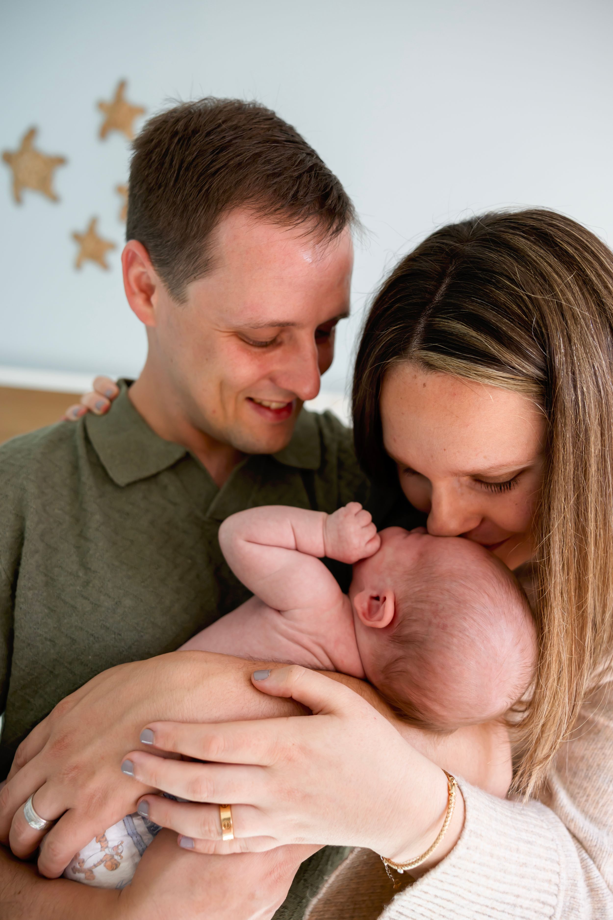 A series of intimate close-up shots showing affectionate moments between a couple.