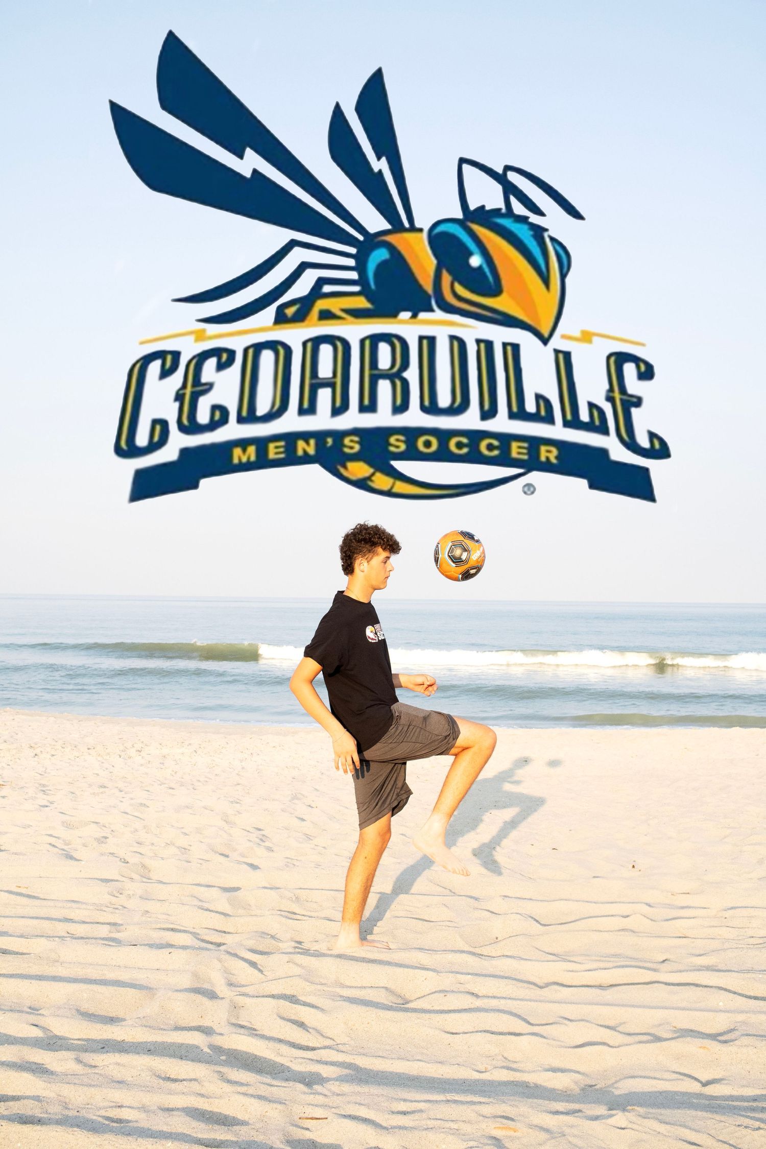 Soccer player practicing ball control moves on sandy beach with Cedarville branding.