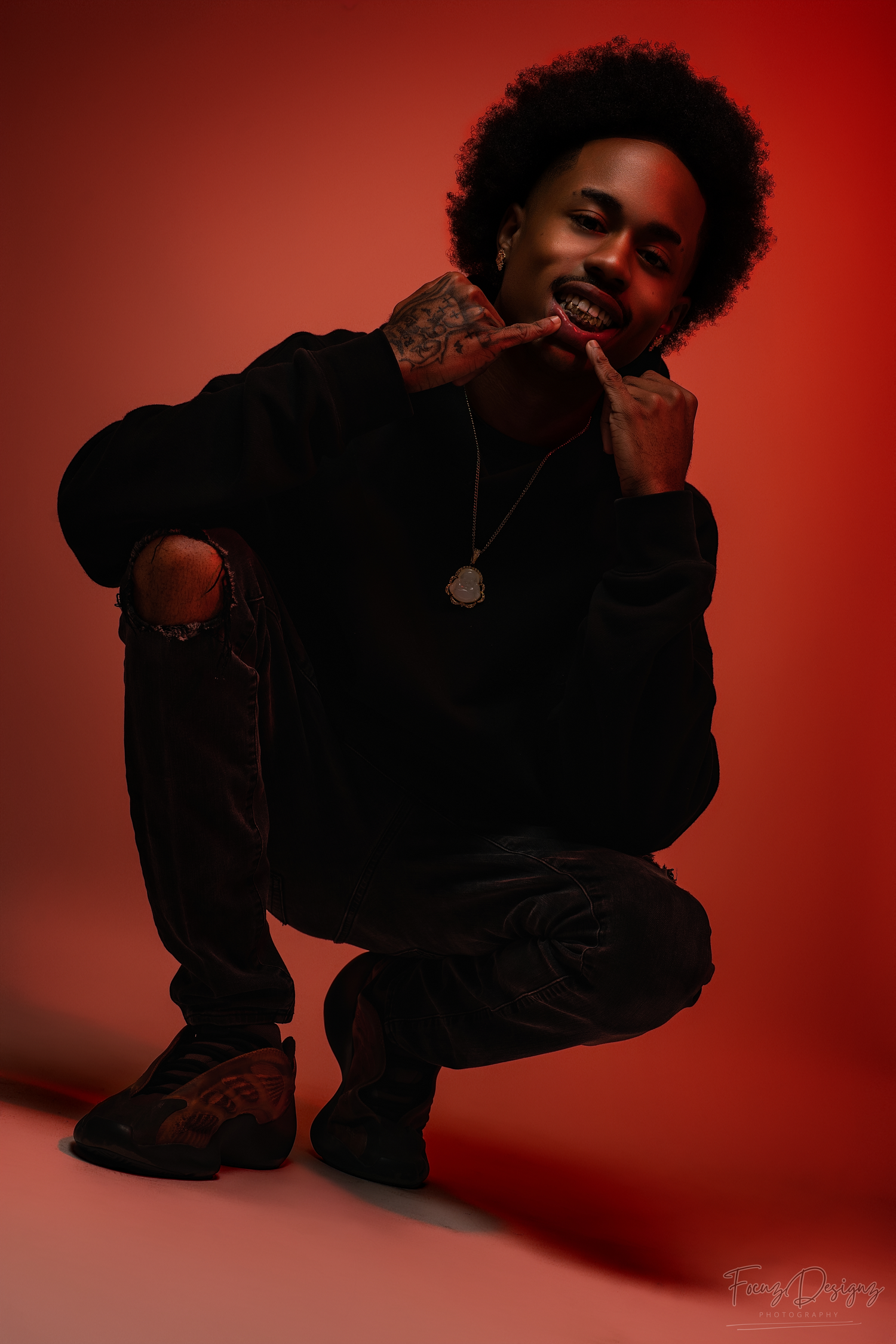 Artistic photo series showing silhouetted figure in black clothing against dramatic red background in various dynamic poses.