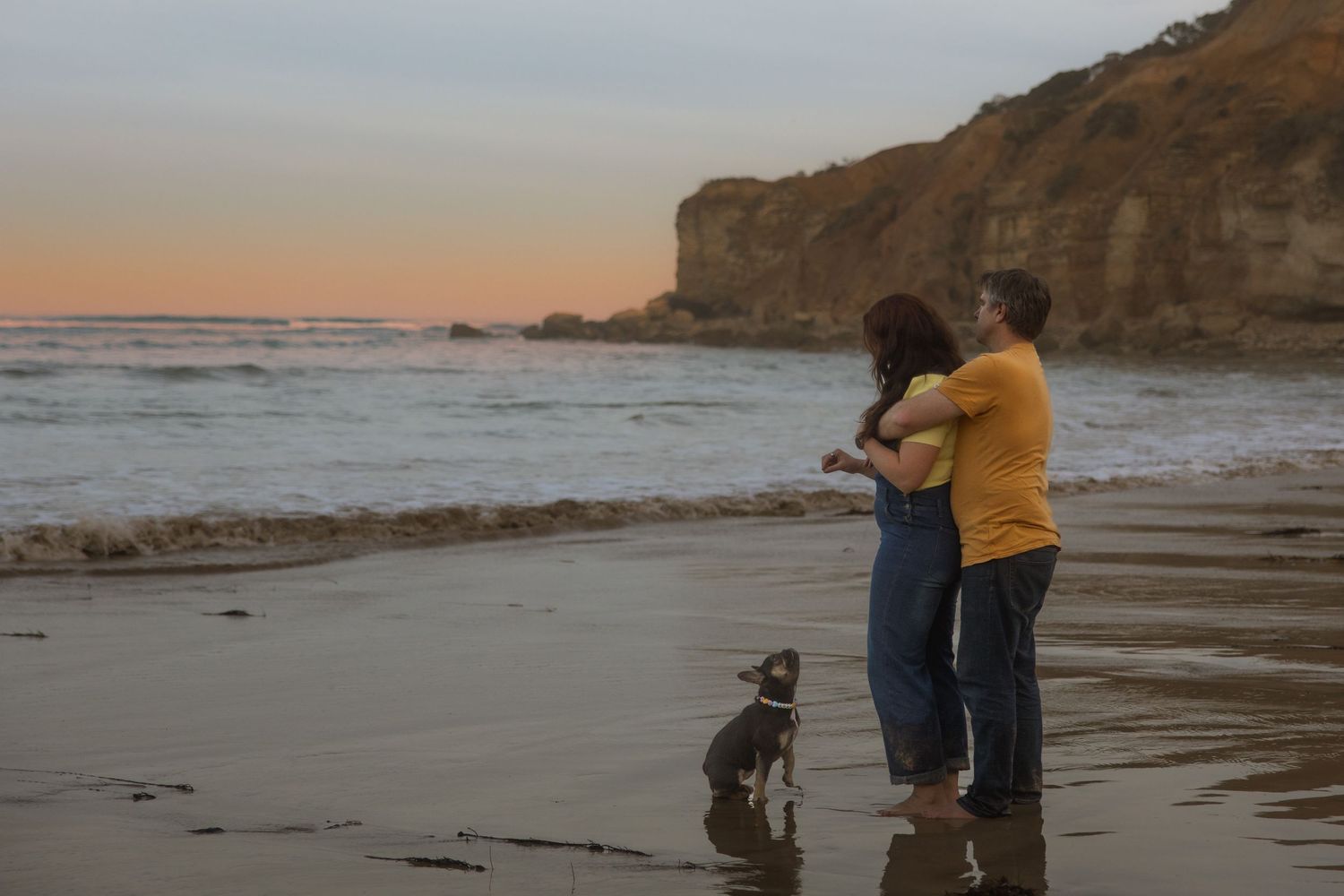 A series of scenic beach photos showing cliffs, sand, and ocean views at sunset along a rugged coastline.