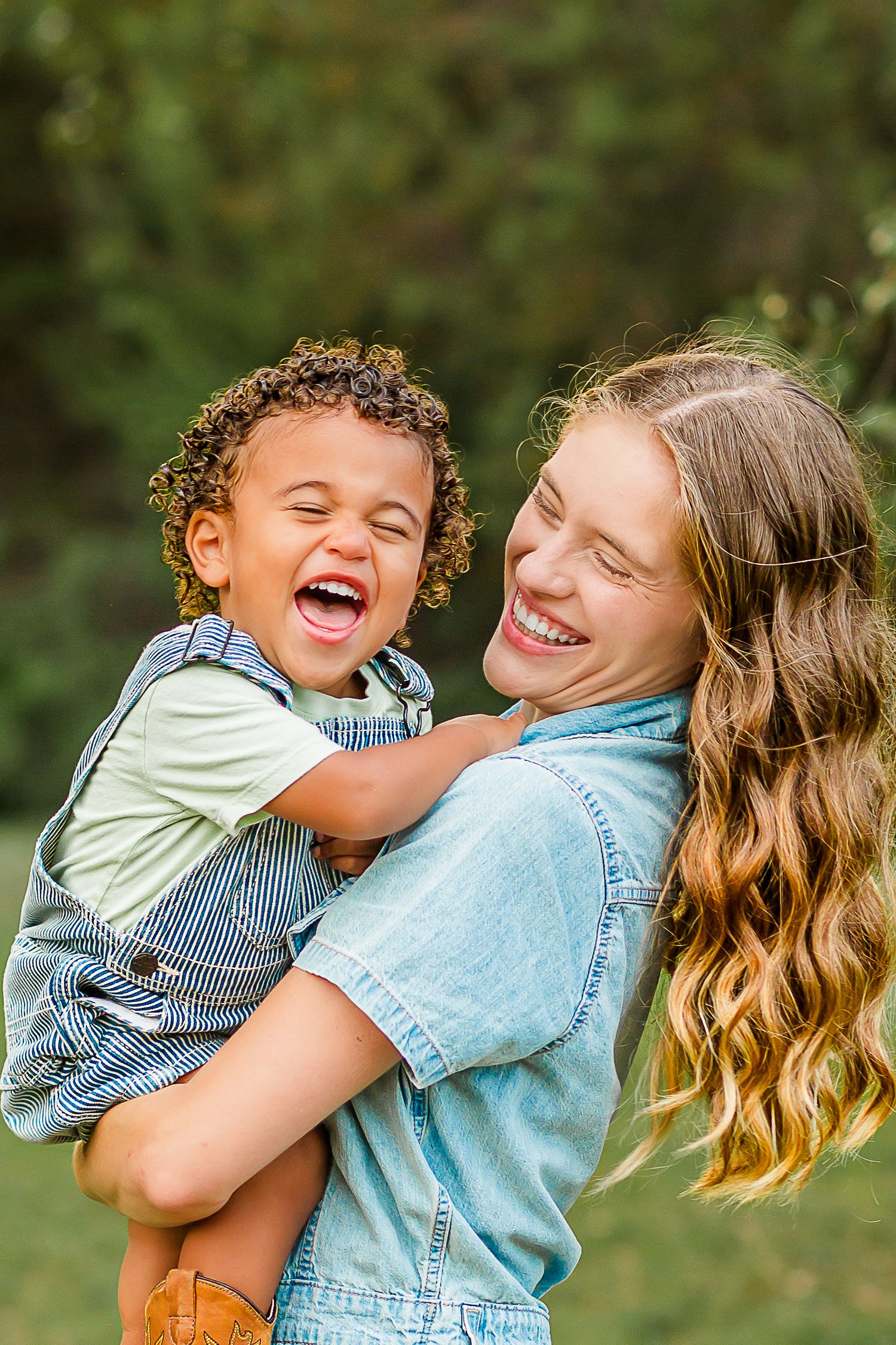 A heartwarming sequence of candid moments showing joyful laughter and embraces between a parent and child outdoors.