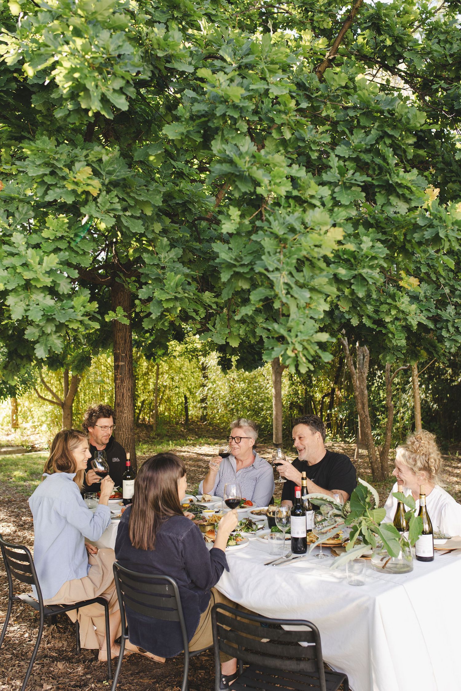 Outdoor dining setup in Stellenbosch vineyard setting