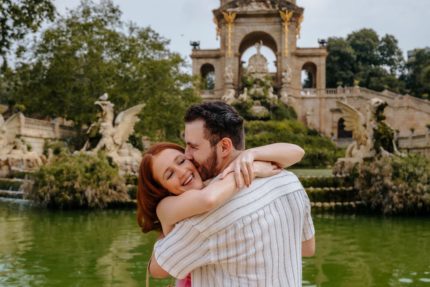 Natural surprise proposal moment in Barcelona for shy couples