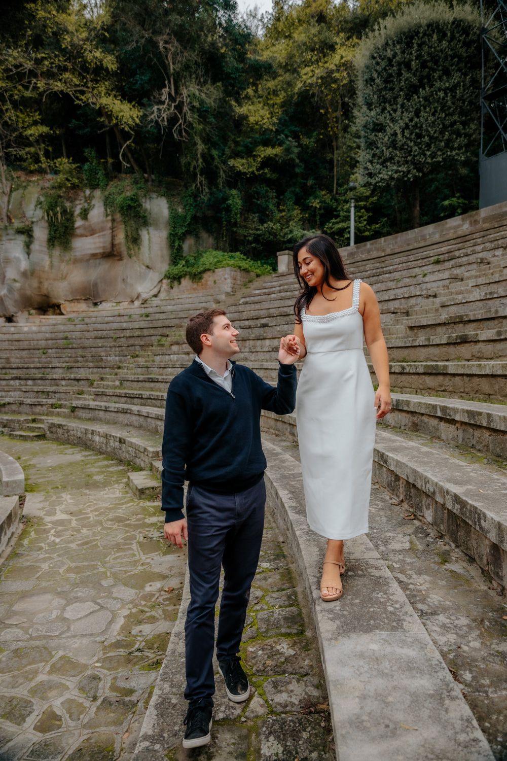 Couple hugging after surprise proposal in Montjuïc Barcelona