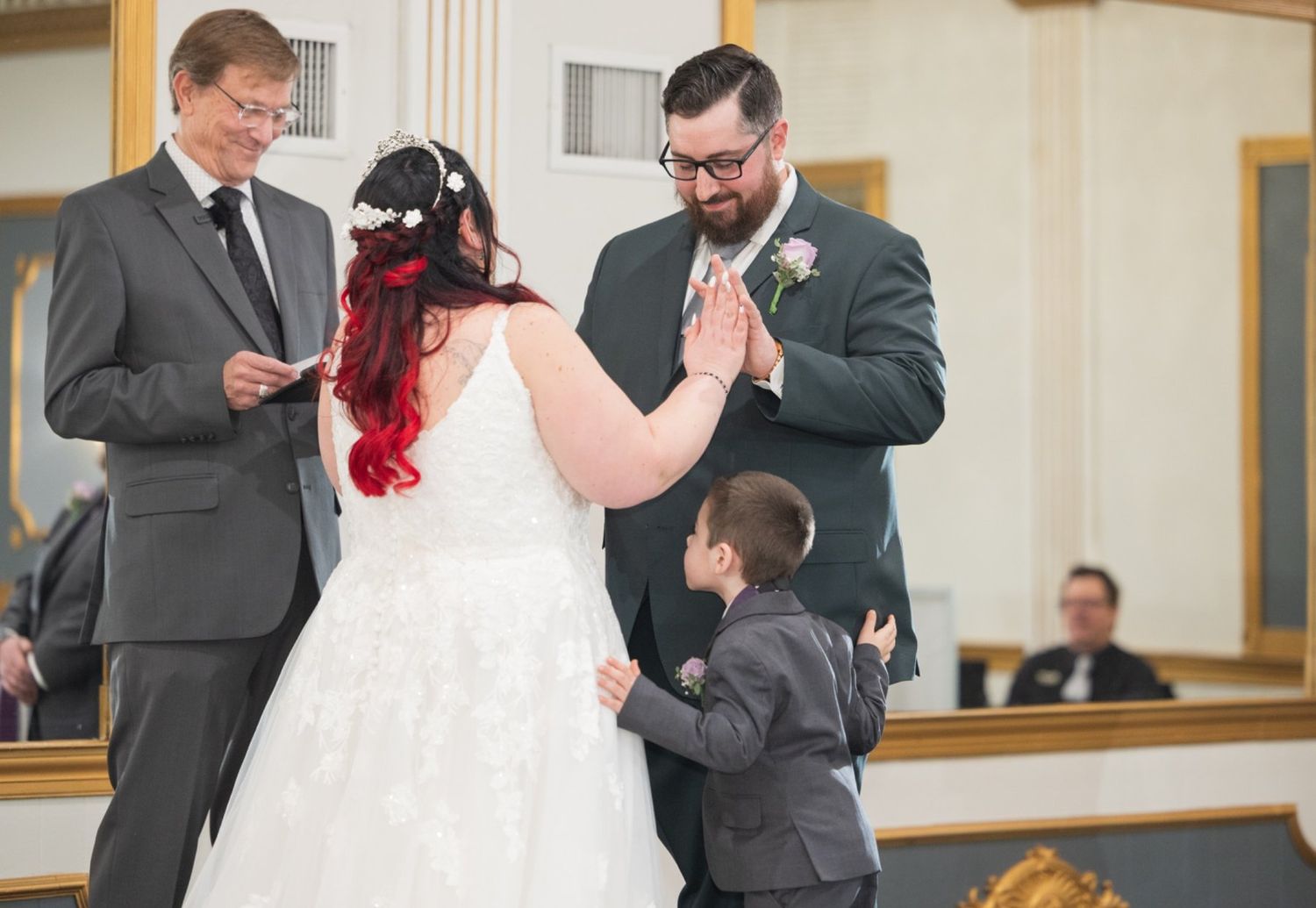 Ring exchange during Kristen and Mat's wedding ceremony at Mendenhall Inn.