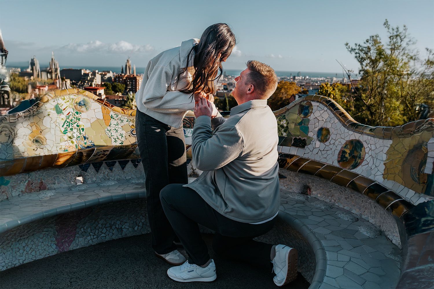 Romantic Park Güell couple photos after a surprise proposal