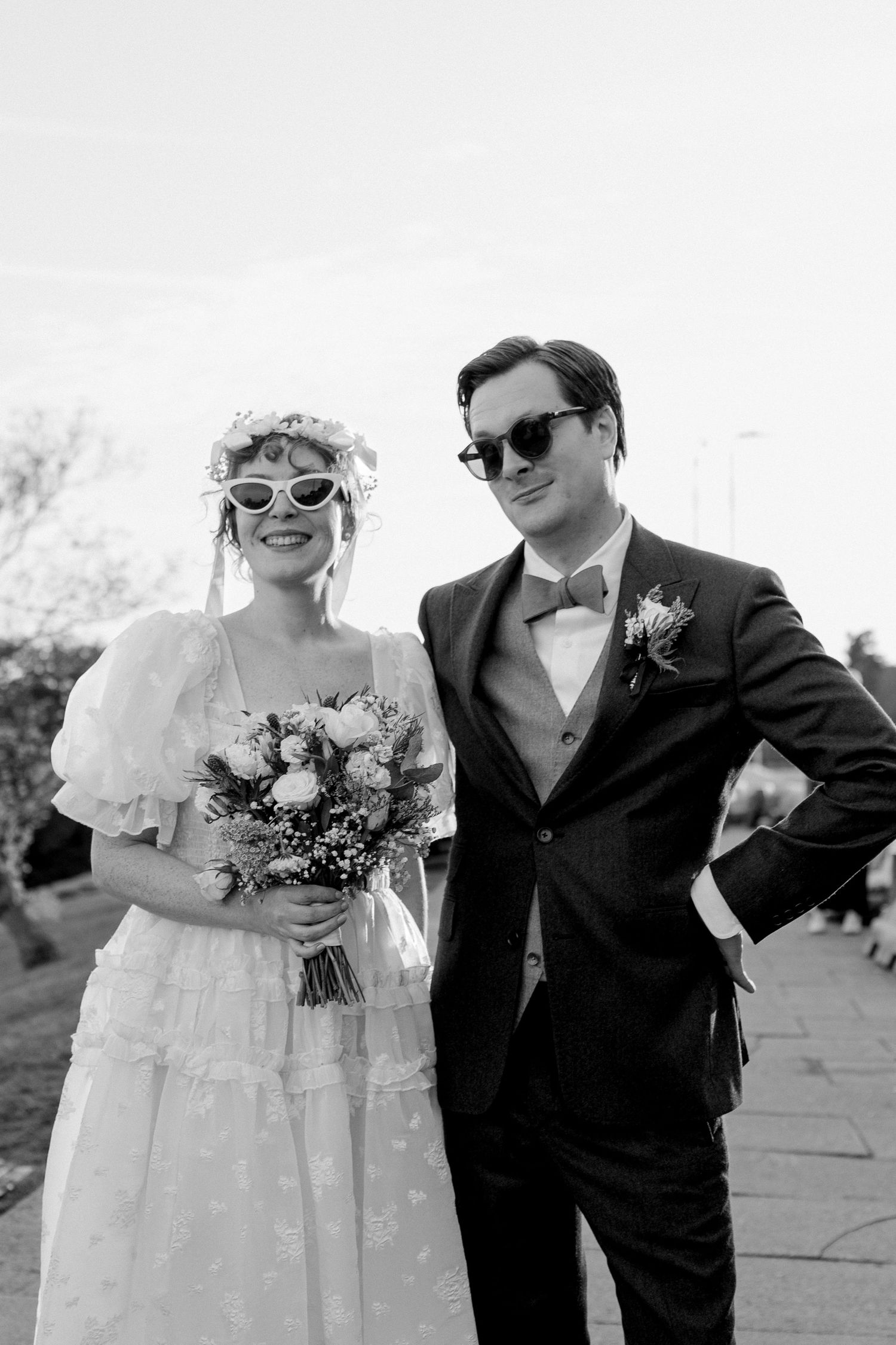 Bride and Groom outside a church in Soho in London having confetti thrown on them