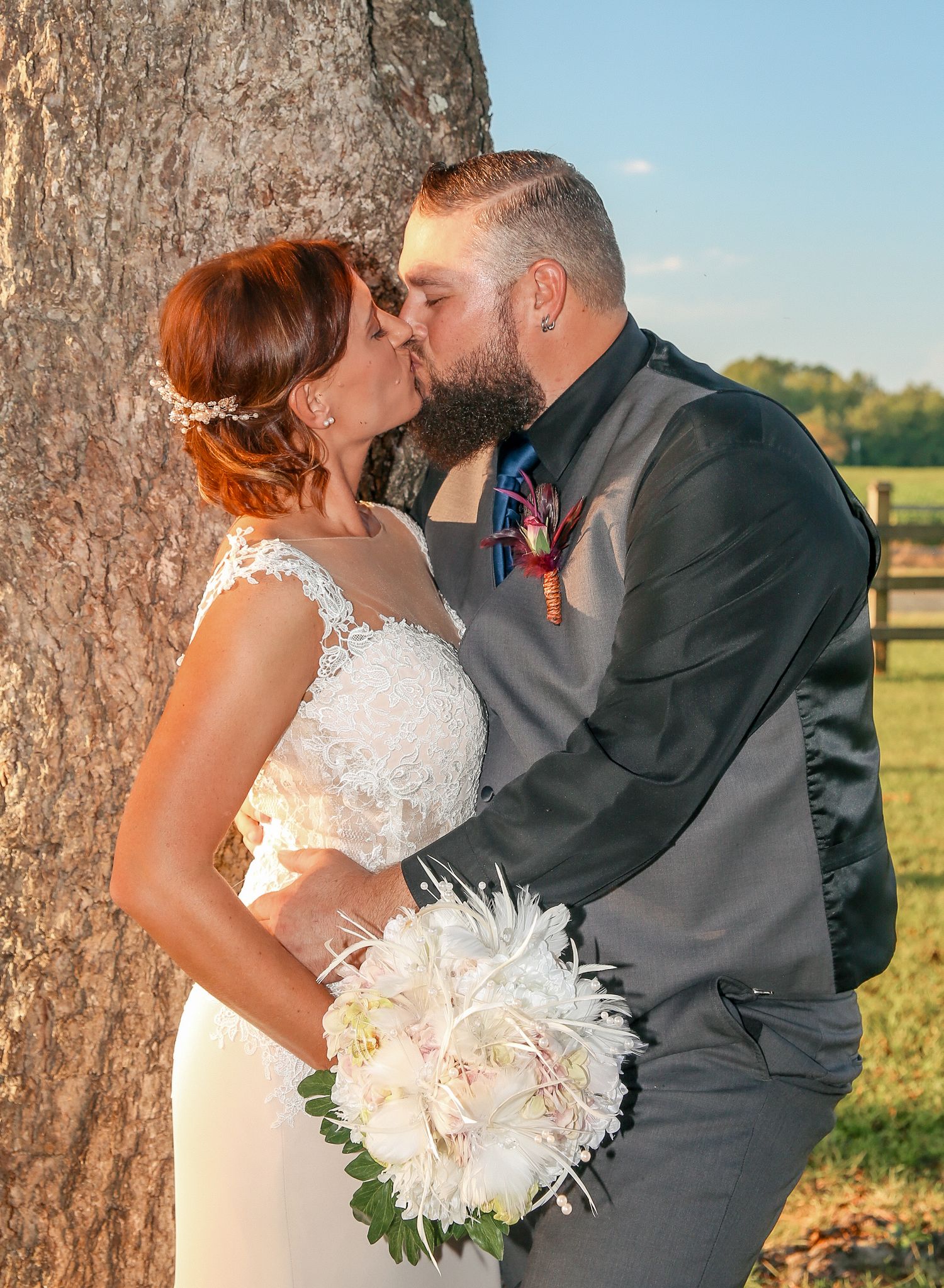 Quiet moment between bride and groom at rustic outdoor wedding, Windsor Ontario.
