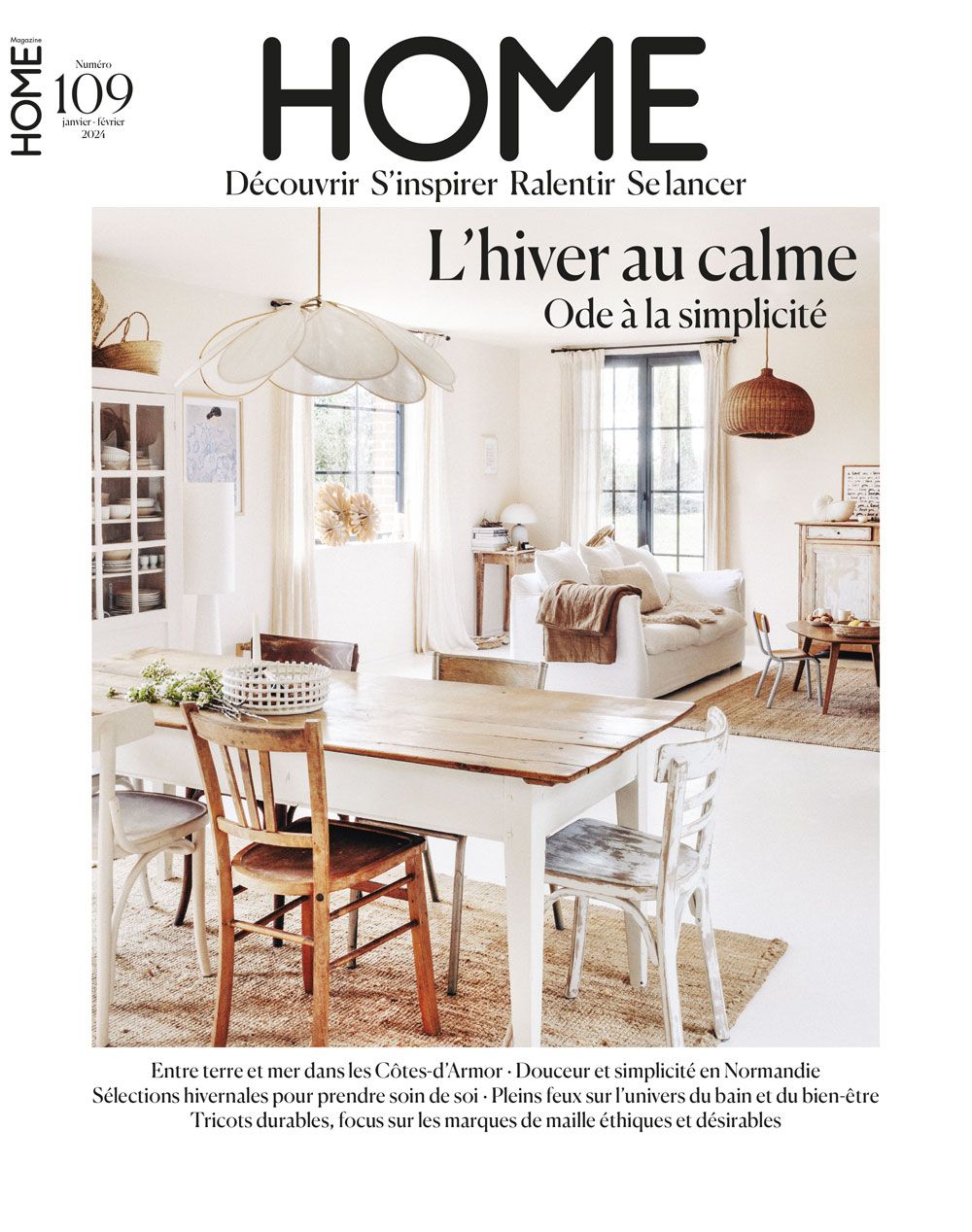 French home decor magazine HOME issue 109 featuring a serene white living room with rustic wooden furniture and natural light.