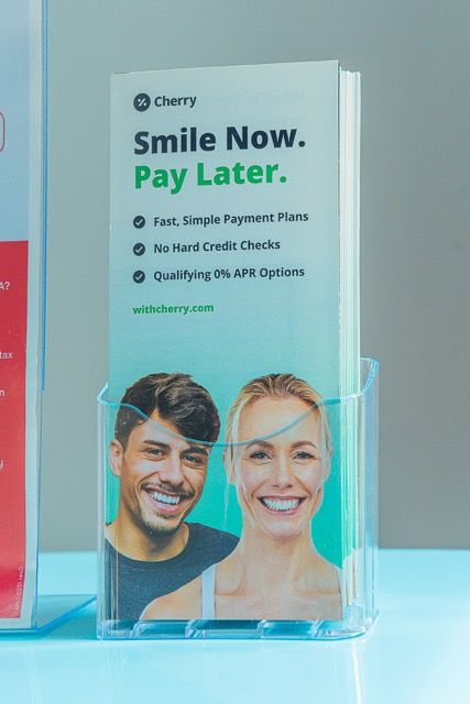 Cherry payment plan brochure displaying Smile Now Pay Later with fast simple payment plans and 0% APR options.
