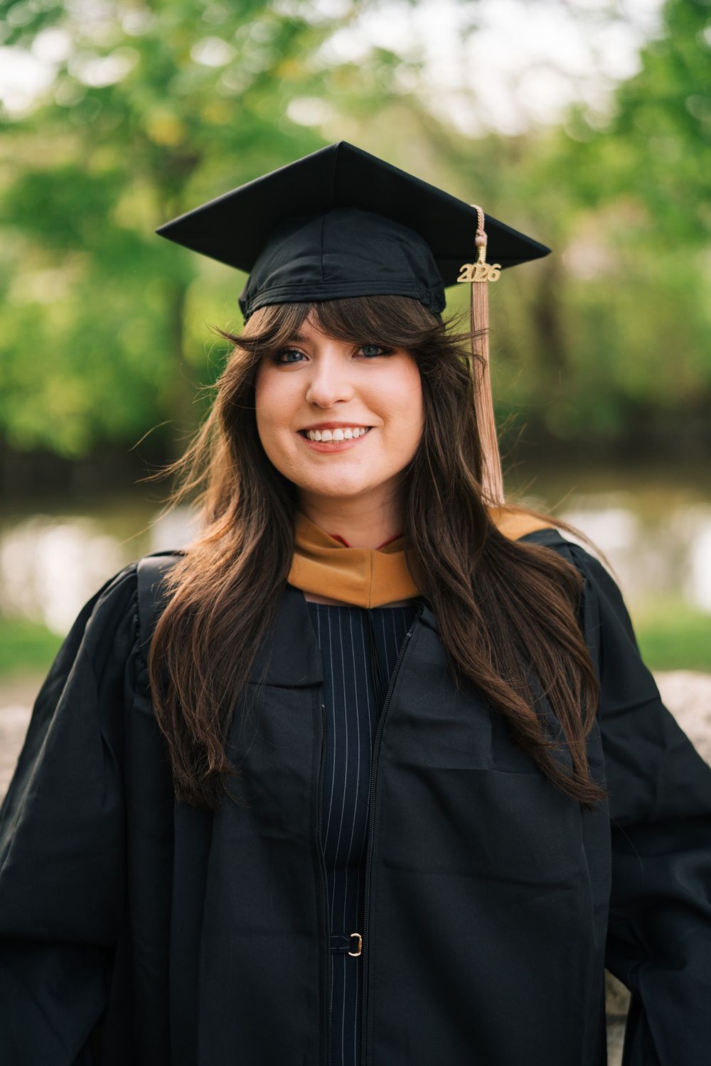 Graduation portraits downtown Lockport, Illinois. Copyright Two Birds Photography 2026
