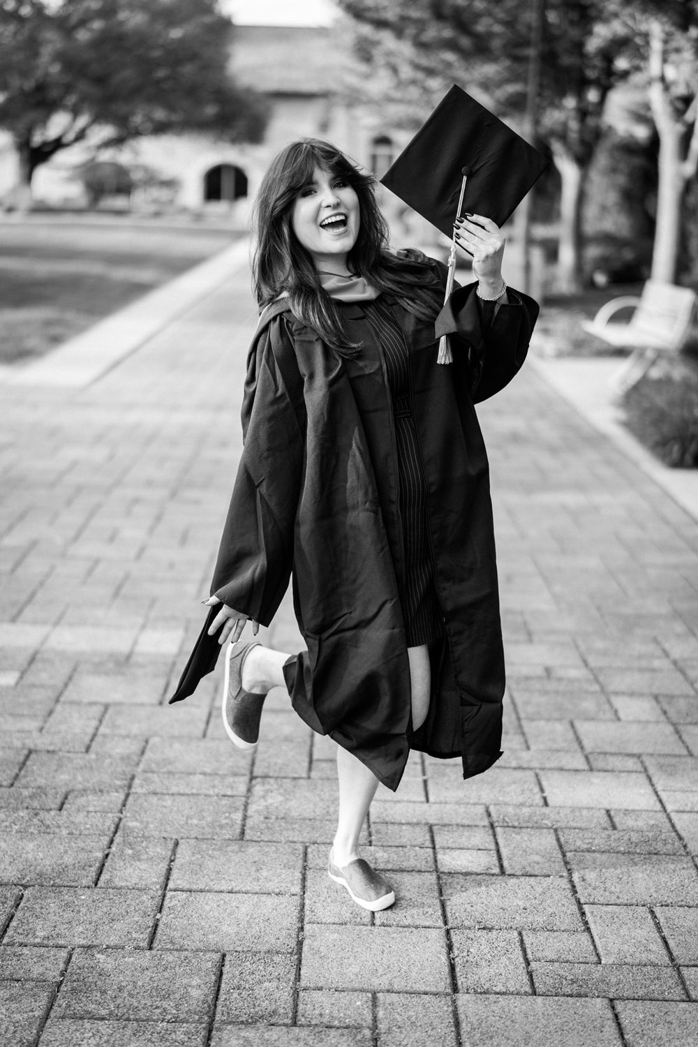 Graduation portraits downtown Lockport, Illinois. Copyright Two Birds Photography 2026