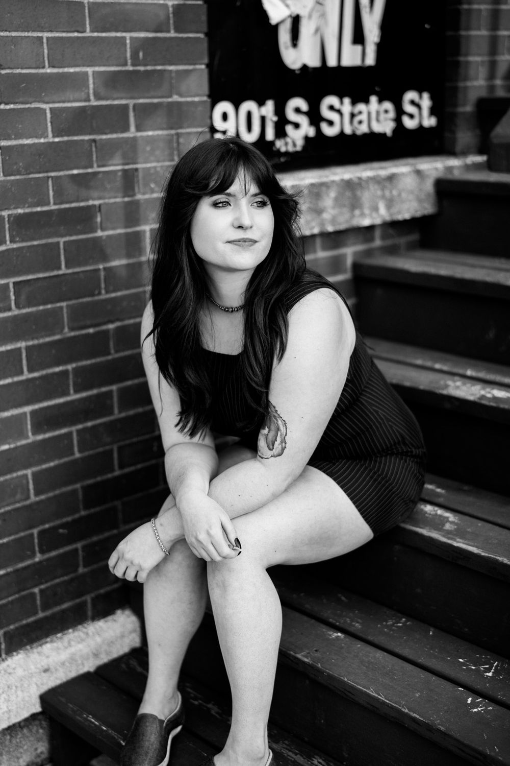 Graduation portraits downtown Lockport, Illinois. Copyright Two Birds Photography 2026