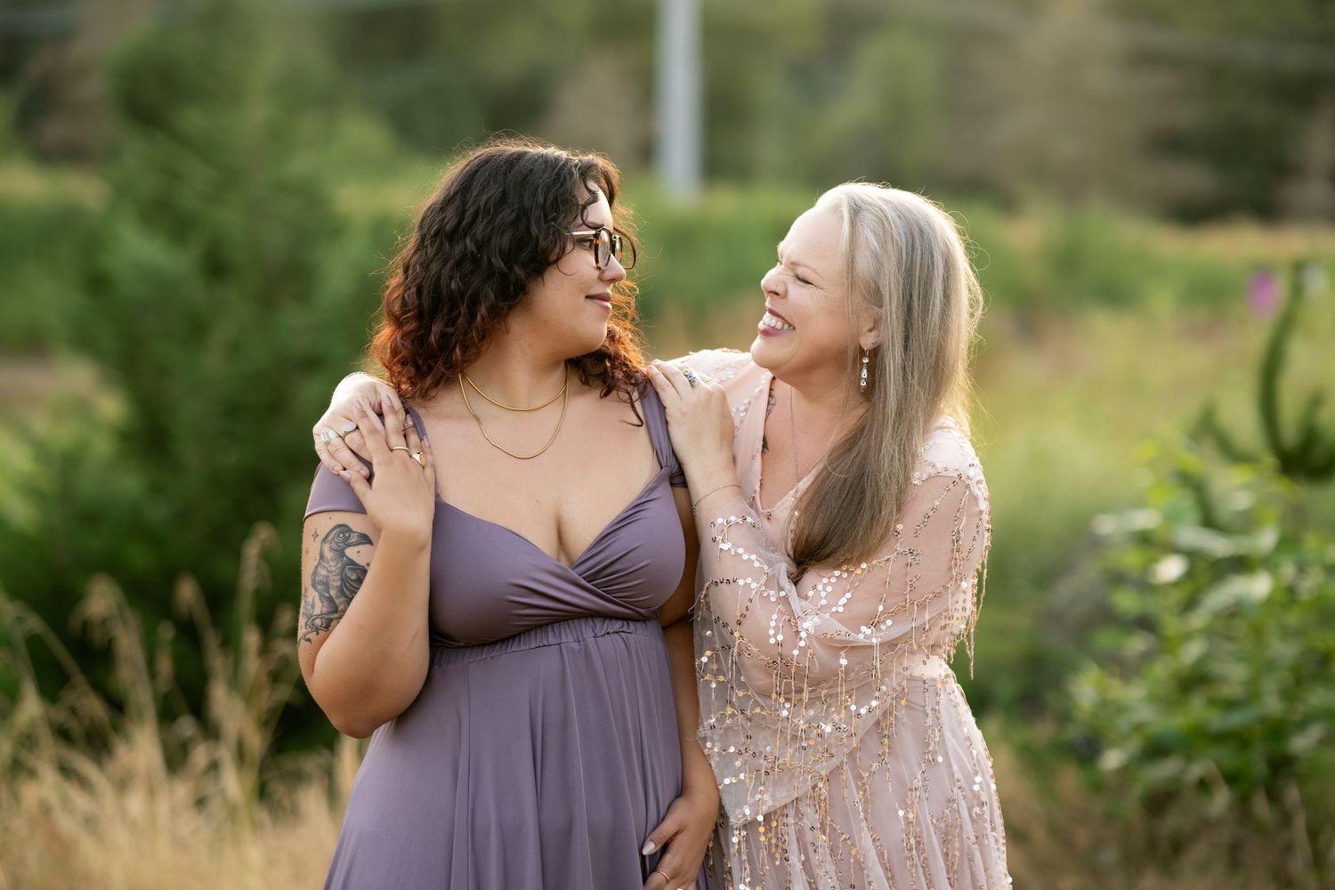 Candid outdoor portraits by Filling the Frame Photography in a lush green summer garden setting at Brightwater Education Center  Woodinville