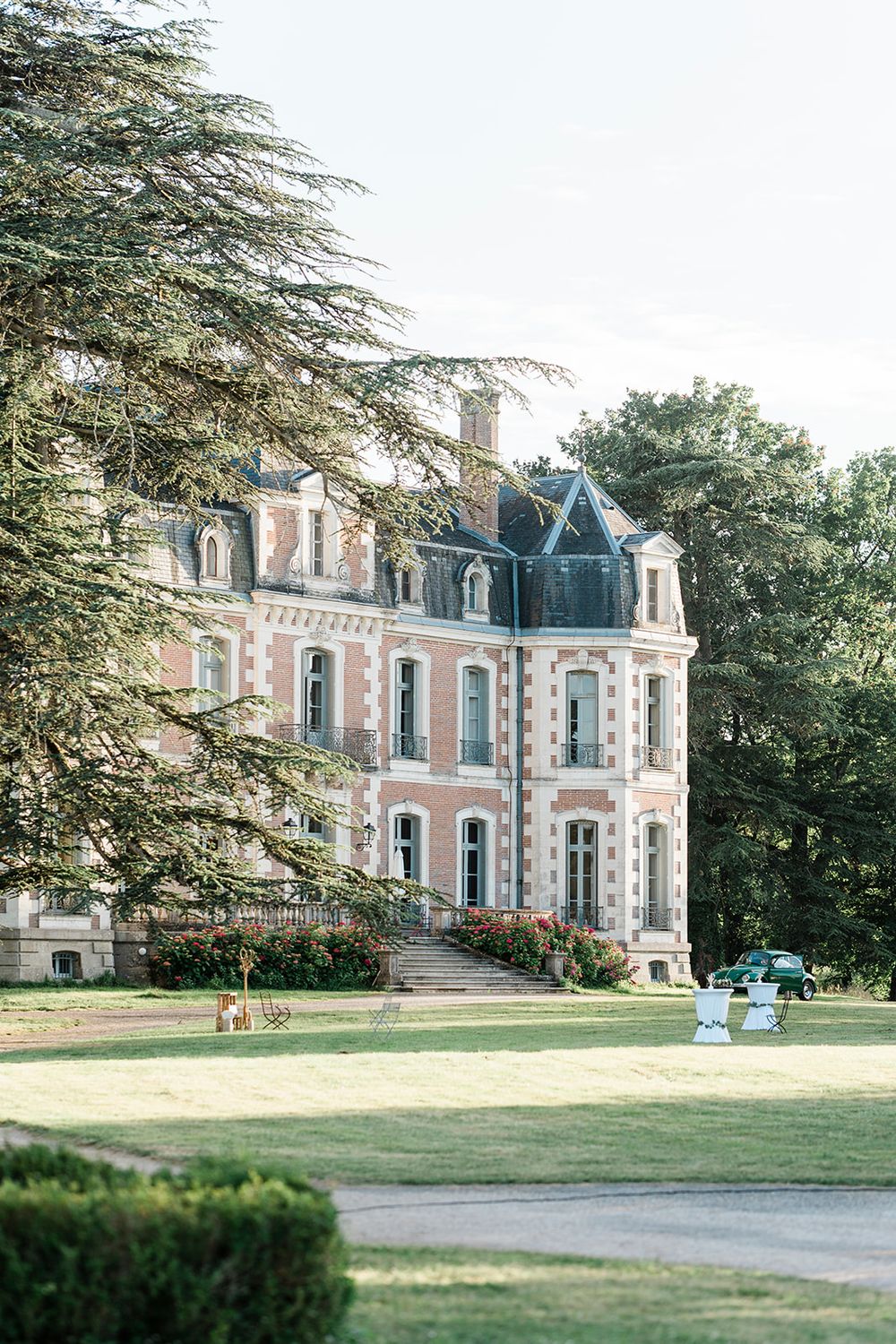 Elegant Dordogne château wedding venue with gardens and historic architecture, captured in South of France destination wedding photographer