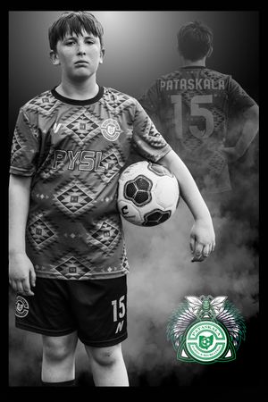 Young athlete in geometric patterned uniform poses with soccer ball against smoky backdrop with team logo.