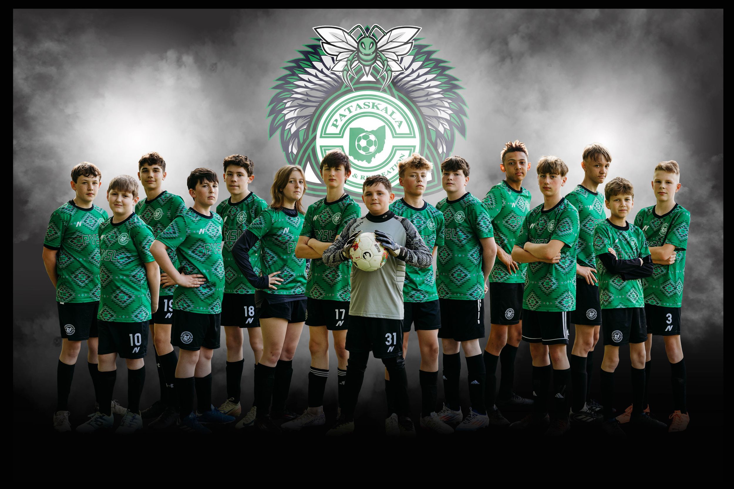 Soccer team players wearing green jerseys pose together in formation with club logo illuminated behind them.