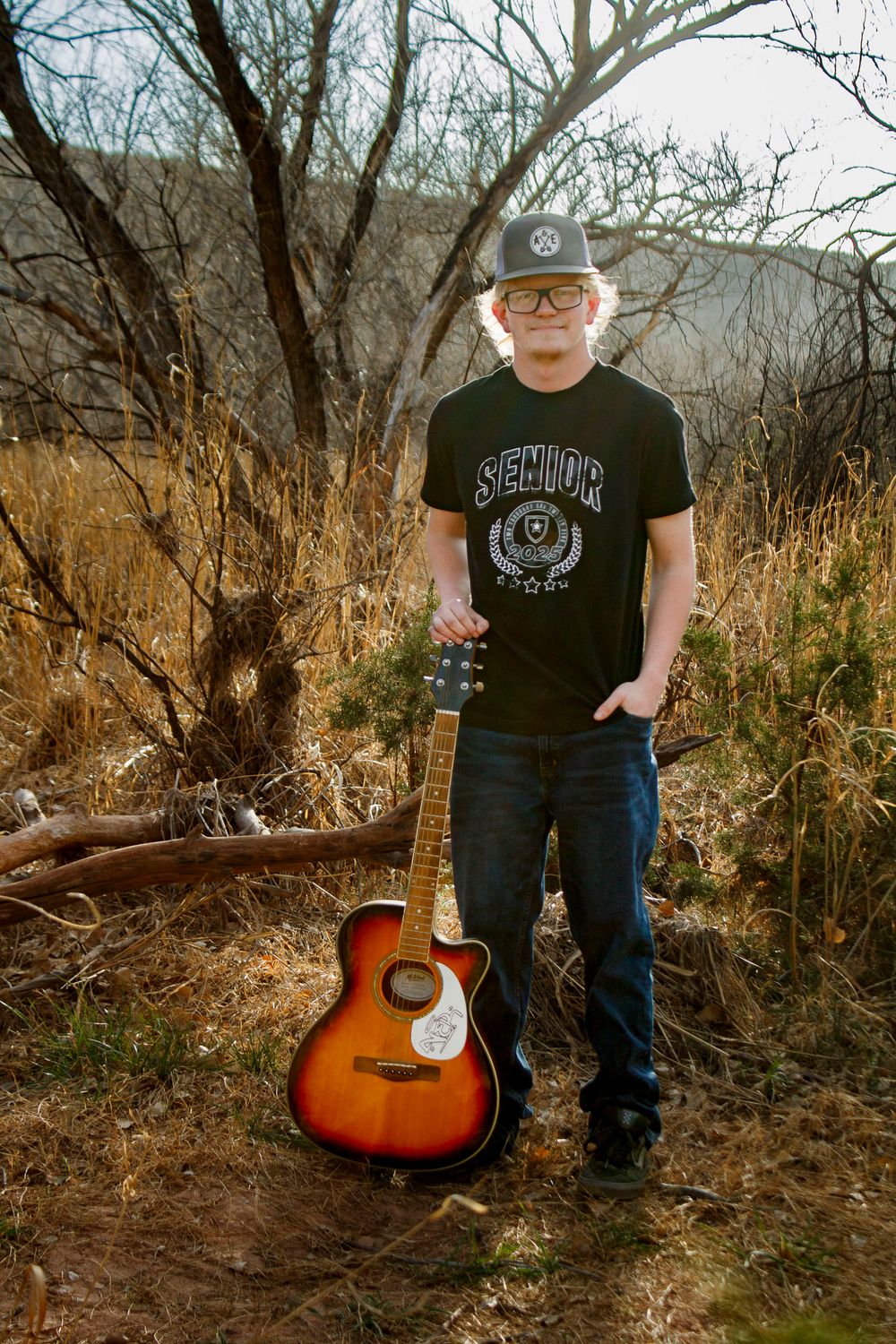 A River Road High School Senior during a senior photo session at Palo Duro Canyon State Park in Canyon, Texas