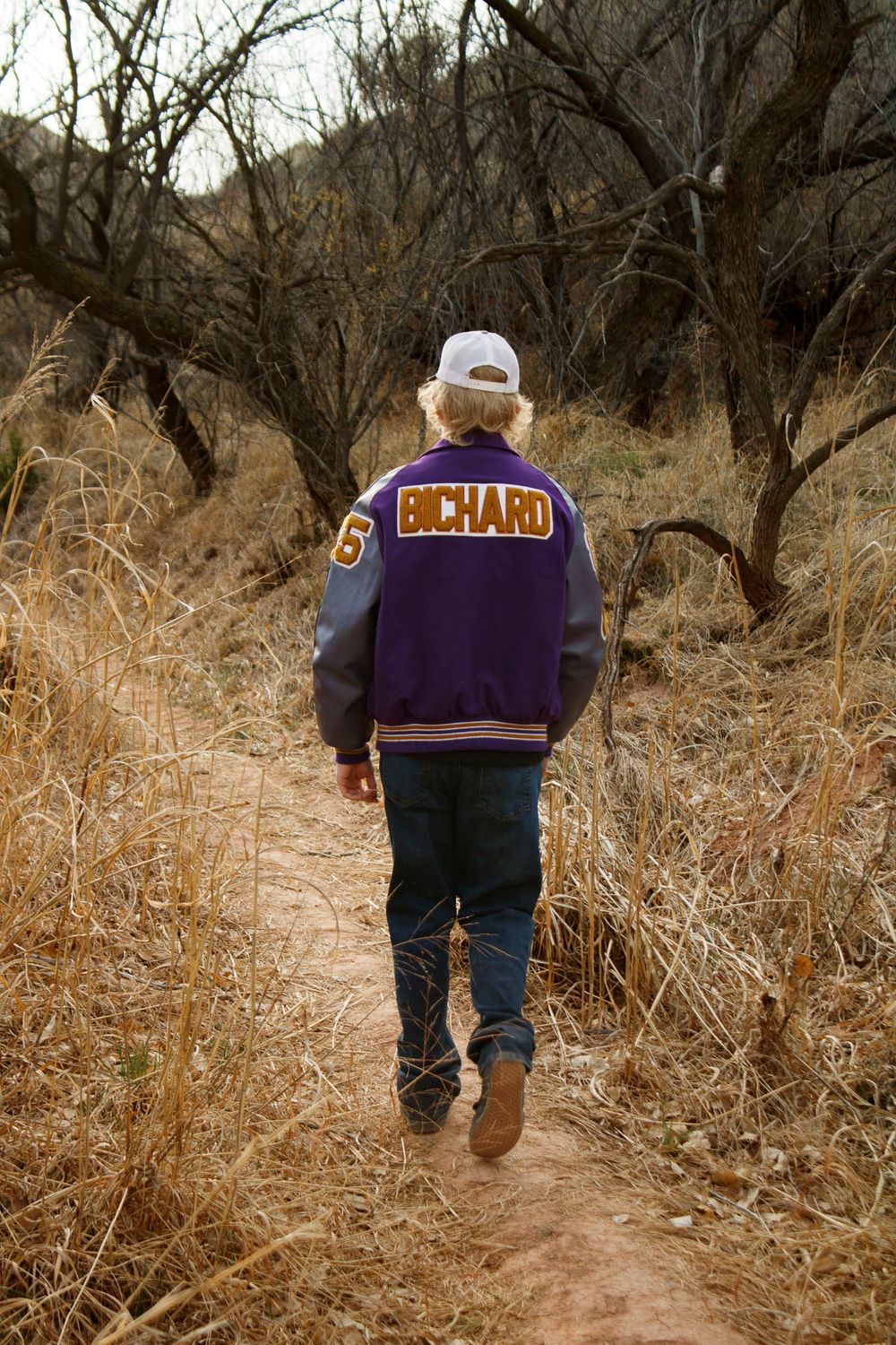 A River Road High School Senior during a senior photo session at Palo Duro Canyon State Park in Canyon, Texas