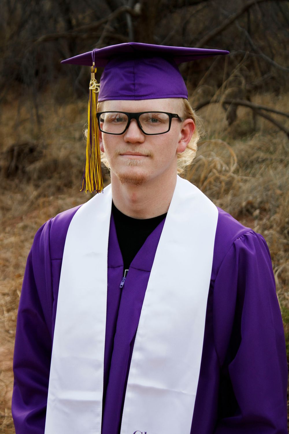 A River Road High School Senior during a senior photo session at Palo Duro Canyon State Park in Canyon, Texas