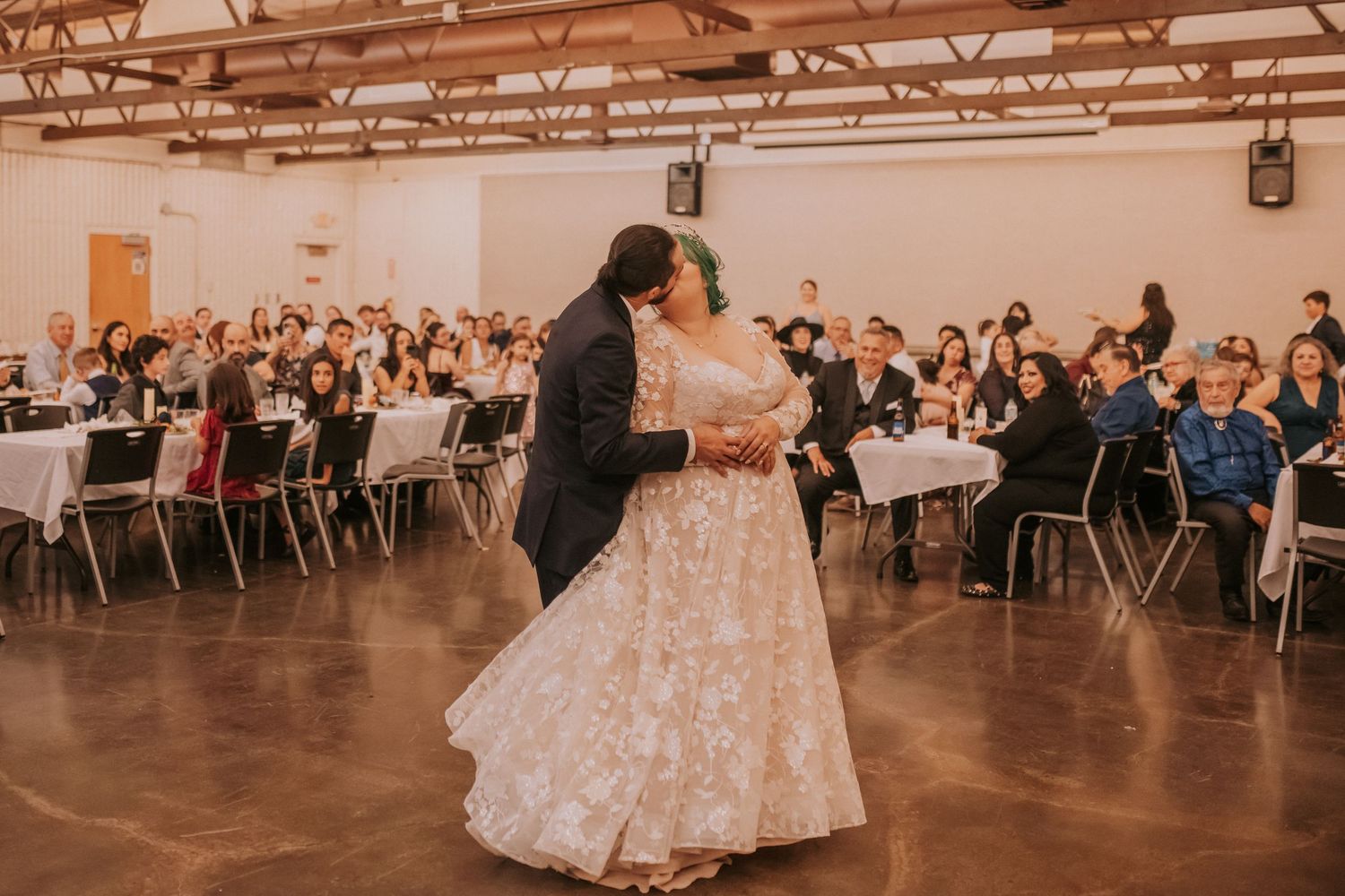 Couple shares their first dance at their reception. Small weddings in New Mexico. Intimate wedding venues. Albuquerque Garden Center wedding
