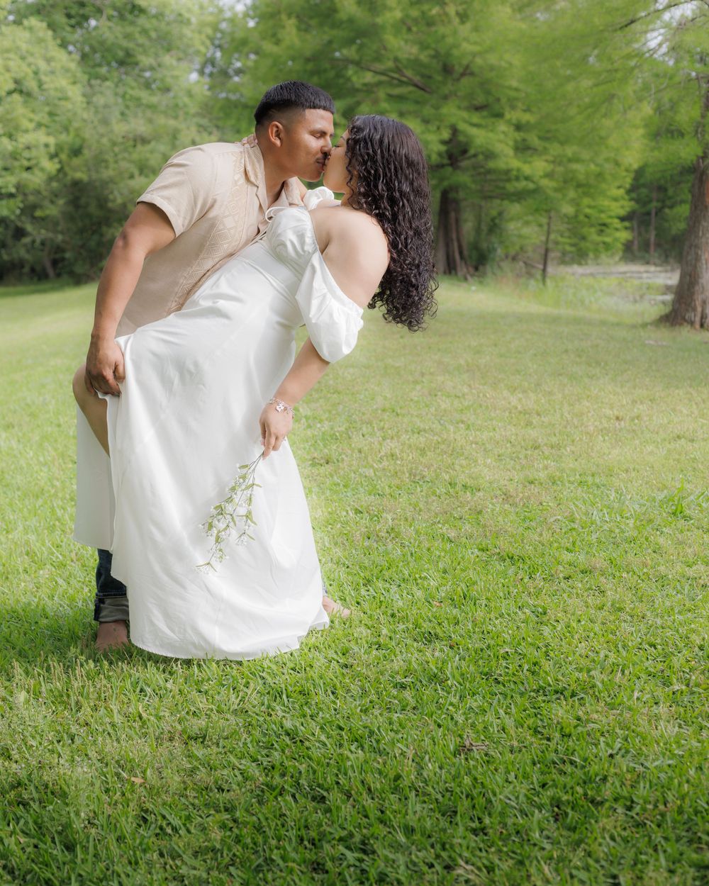 A beautiful moment where the couple shared a moment while husband did the traditional dip.