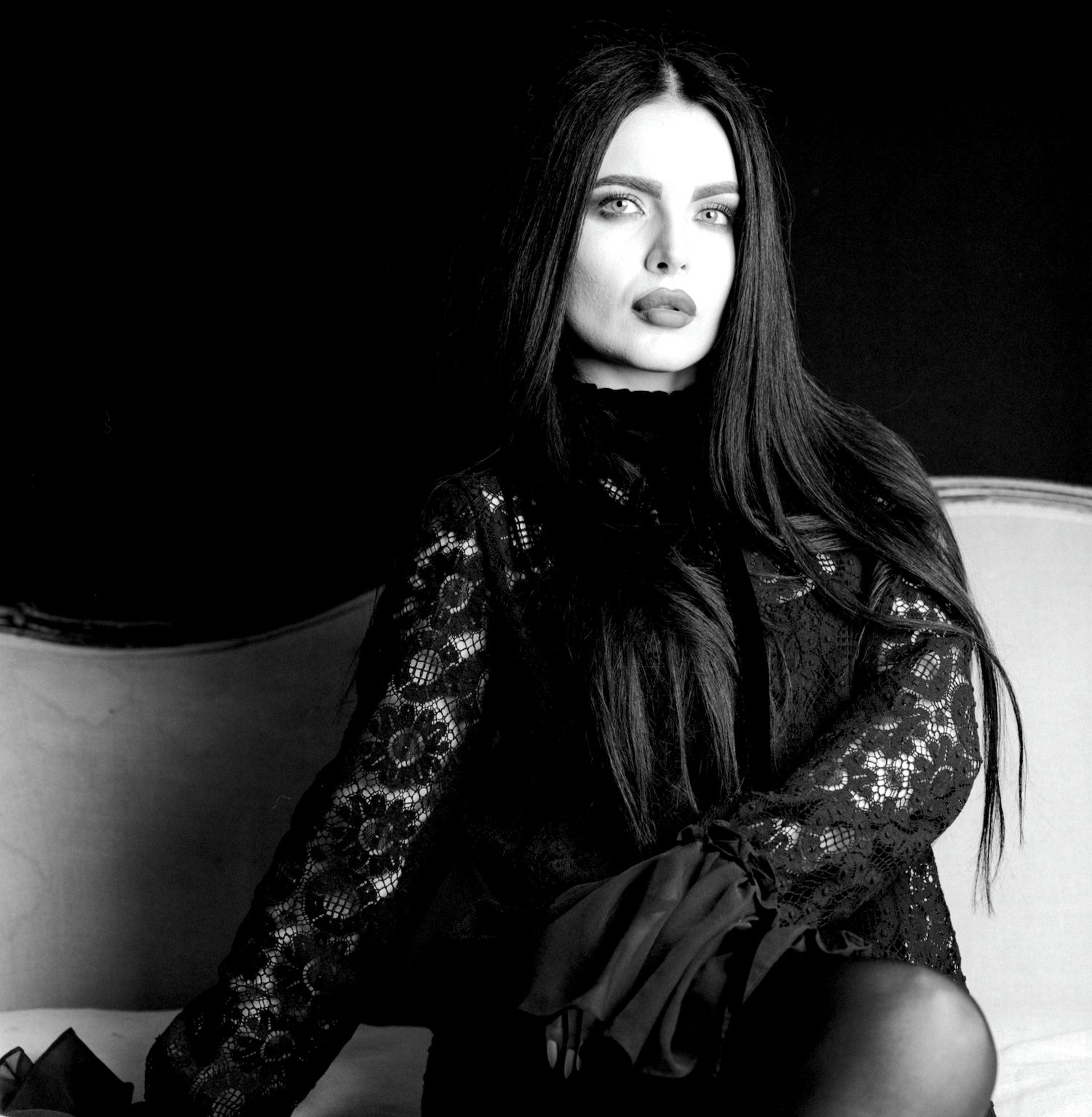 Black and white portrait of Volodina wearing Beautiful Creatures clothing