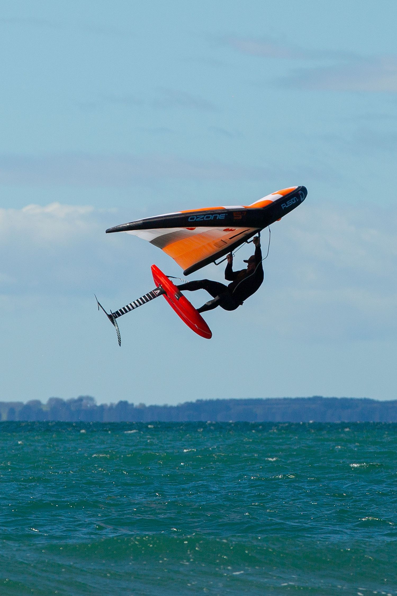 "Action sports photography be it kite surfing, wing foiling, surfing, and wave riding. High-energy ocean shots of extreme water sports."