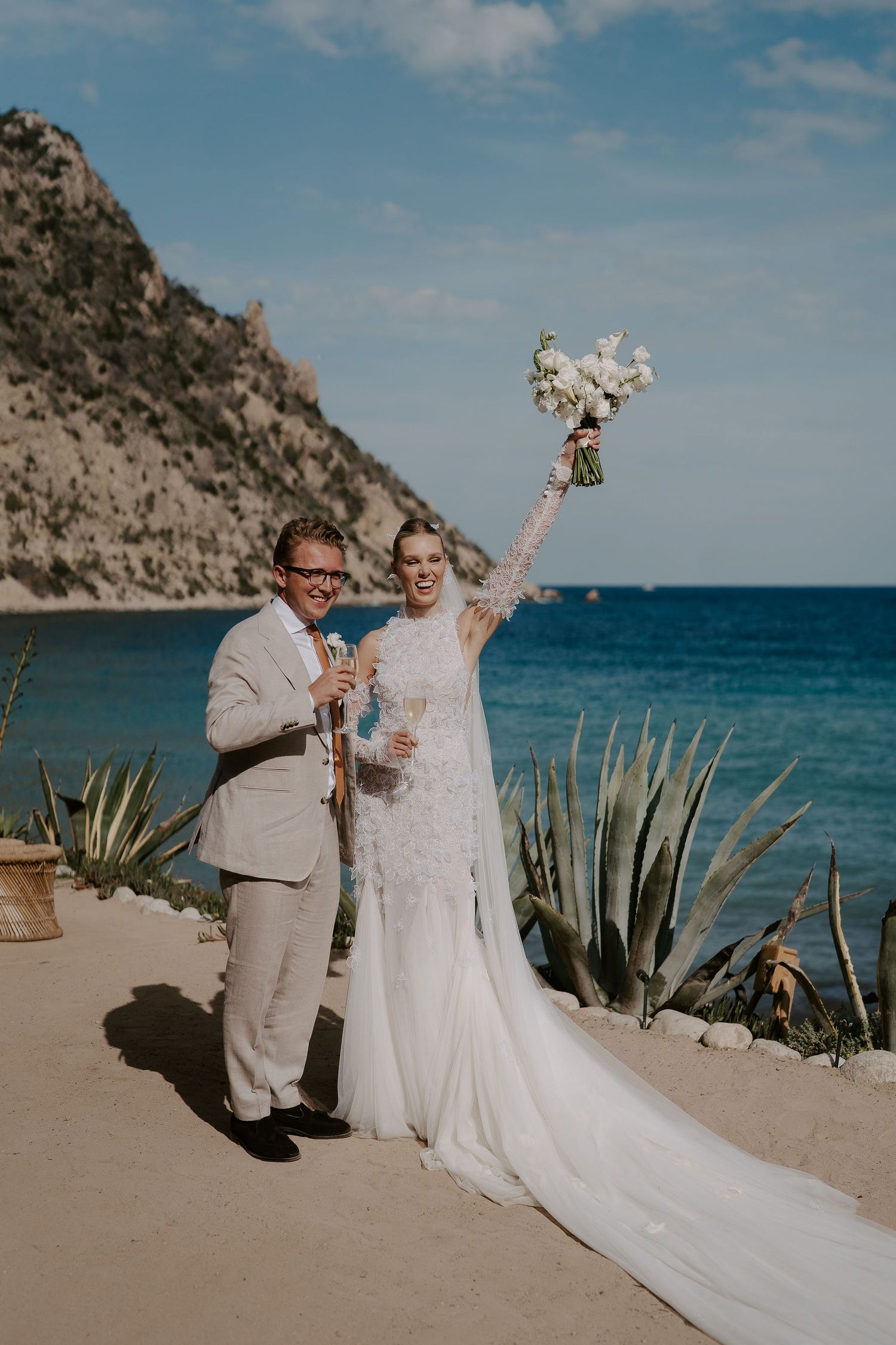 bride and groom cheering and toasting at Amante Ibiza